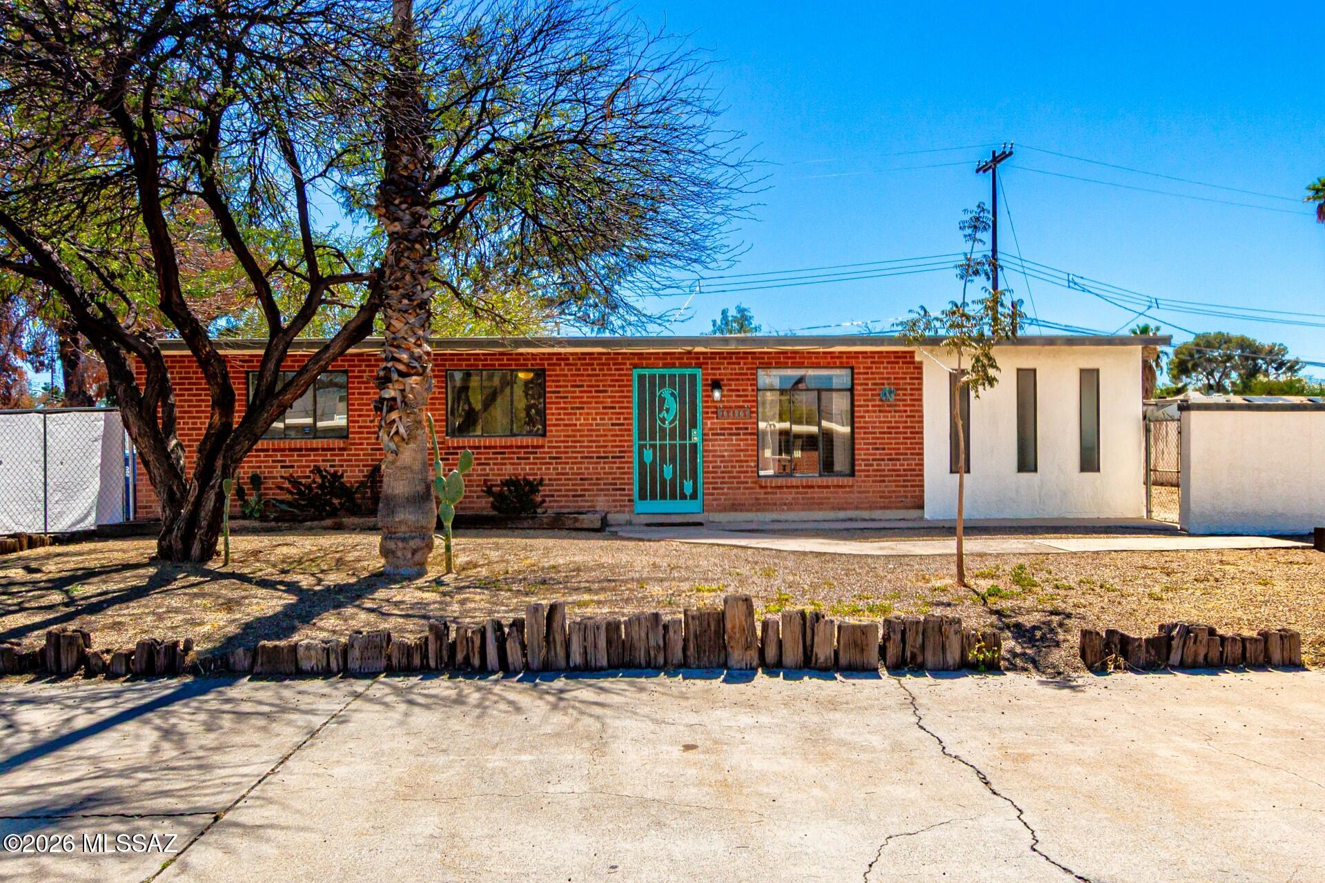 Move-in ready and full of charm, this beautifully updated 4-bedroom, 2-bath home sits on a spacious 0.22-acre lot. Built in 1960 and thoughtfully refreshed, the home features stylish wood-look tile flooring, granite countertops, updated lighting, and a bright open-concept layout that feels both welcoming and functional. The spacious primary suite offers a large walk-in closet, providing plenty of storage and comfort. Step outside to a generous backyard with endless possibilities--perfect for entertaining, gardening, or simply relaxing under the Arizona sky. Additional highlights include a newer HVAC system and a recently coated roof for added peace of mind. Located near shopping, schools, and major routes, this home combines classic character with modern updates and everyday convenience.