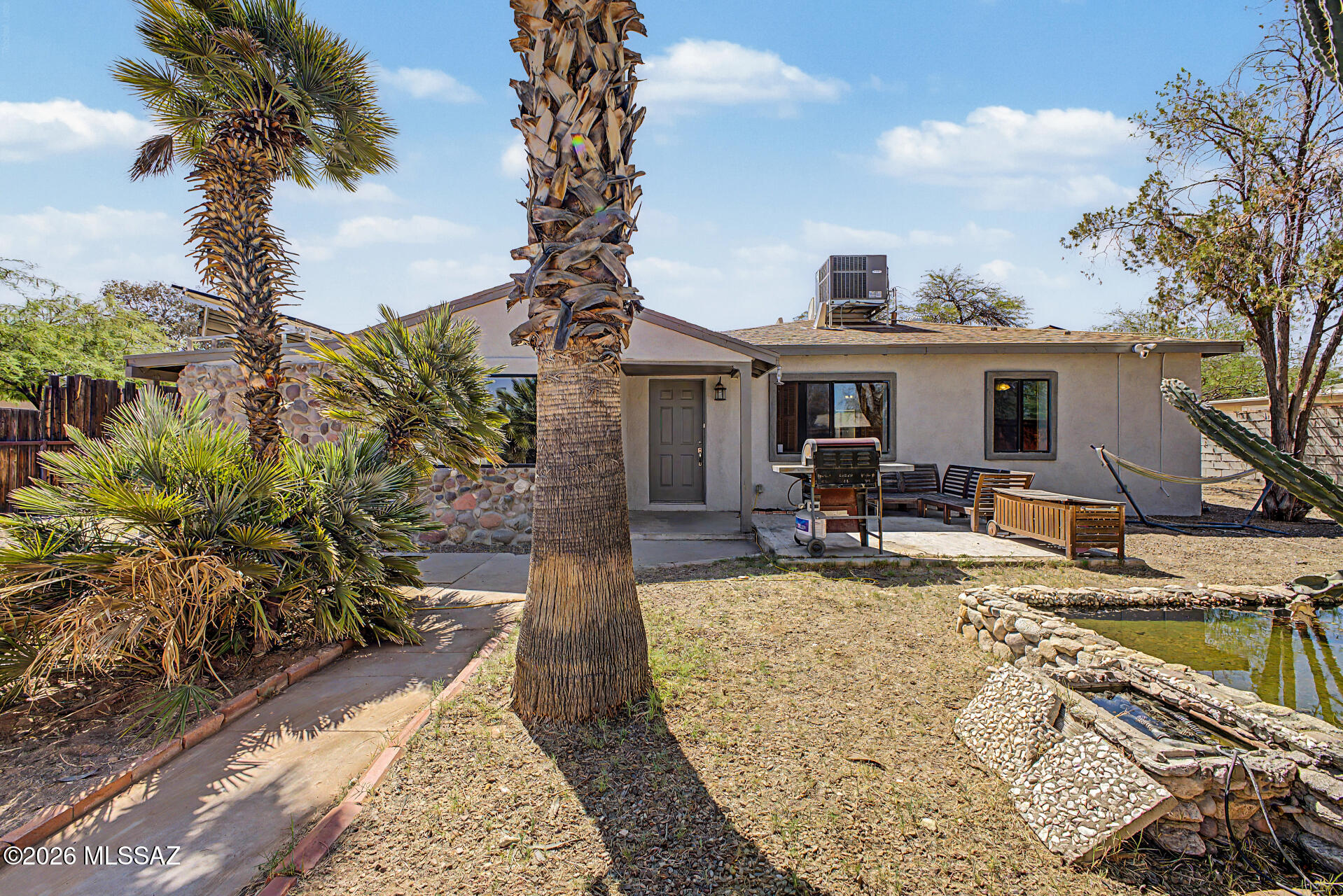 Step into a piece of timeless charm with this beautifully updated 3-bedroom, 2-bathroom home that perfectly blends mid-century character with modern comfort. Built in 1950, this one-of-a-kind property showcases stunning interior rock work that adds warmth, texture, and a truly unique personality you won't find anywhere else.
Inside, you'll find brand-new carpet underfoot and a thoughtfully updated kitchen designed for both style and functionality, ideal for everyday living and entertaining alike. The home's classic bones have been lovingly preserved while modern upgrades ensure effortless comfort for today's lifestyle.
Adding exceptional value, the paid solar system means lower utility bills from day one. Whether you're drawn in by the craftsmanship of a bygone era or the peace of mind that comes with modern updates, this home delivers it all. A rare find with character, comfort, and cost-saving features -- don't miss your chance to make it yours!