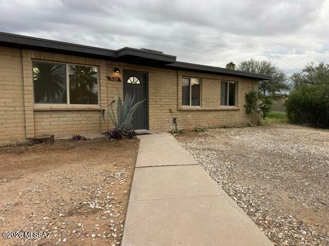 Beautifully remodeled 3-bedroom, 2-bath home situated on a large lot on the east side of town, conveniently located near shopping, dining, and everyday amenities. Updates include new windows, fresh interior paint, tile flooring throughout, and a stylish new kitchen featuring quartz countertops. Both bathrooms have been refreshed with new tile surrounds, vanities, fixtures, and lighting. Additional highlights include ceiling fans throughout and convenient rear-yard parking accessible from the alley. A move-in-ready home offering comfort, modern updates, and a desirable location. Seller is related to sellers agent, sellers agent has a financial interest in the property.