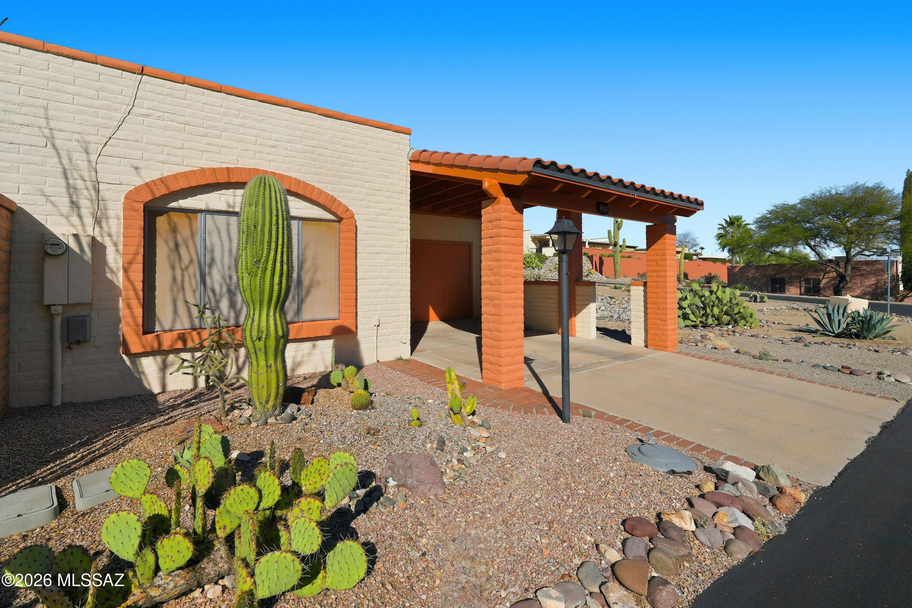 Here's a nicely furnished 2-bedroom townhome featuring ceramic tile flooring throughout for easy maintenance. The layout offers comfortable living spaces and a move-in-ready setup--perfect for anyone seeking low-maintenance living in a tranquil setting. Enjoy added privacy with a natural area buffer in front and along the side of the home, creating a peaceful, open feel.  EZ access to rec centers, golf, and churches. NEW ROOF 1/2026 New sewer line house to street 3/2026
