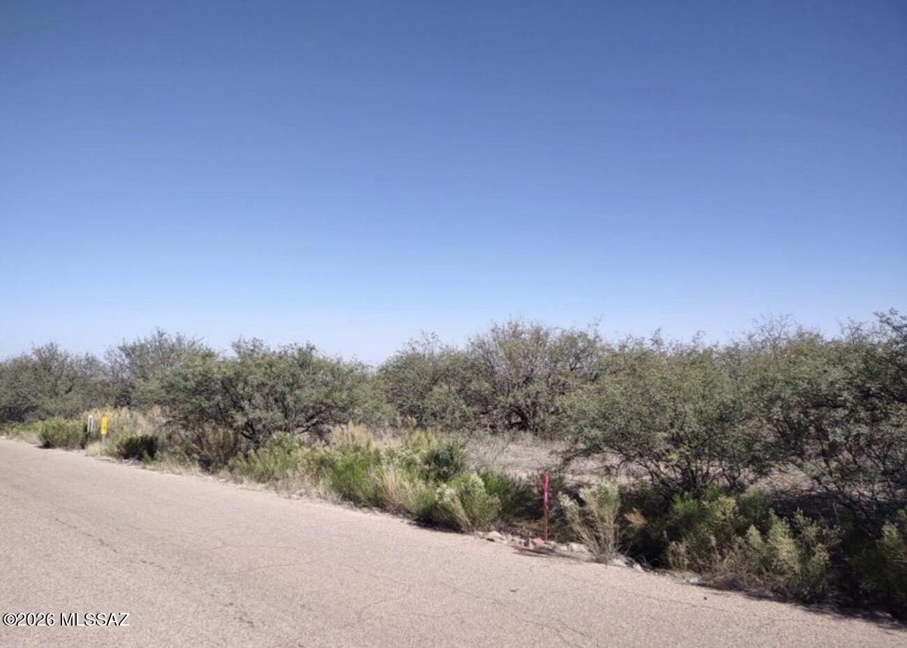 Recently surveyed 6 acre lot in Mescal area ready for your forever home. Utilities at the lot line including water from private water company. Lot offers beautiful views and privacy but easy access to i10 for shopping and other services. All corners are staked with red survey flags and this parcel can be accessed from paved Cherokee Trail. Buyer to do all due diligence regarding utilities, zoning and flood zones. Parcel was recently split, taxes reflected are prior to the split and parcel will have its own legal description and parcel number at close of escrow.
