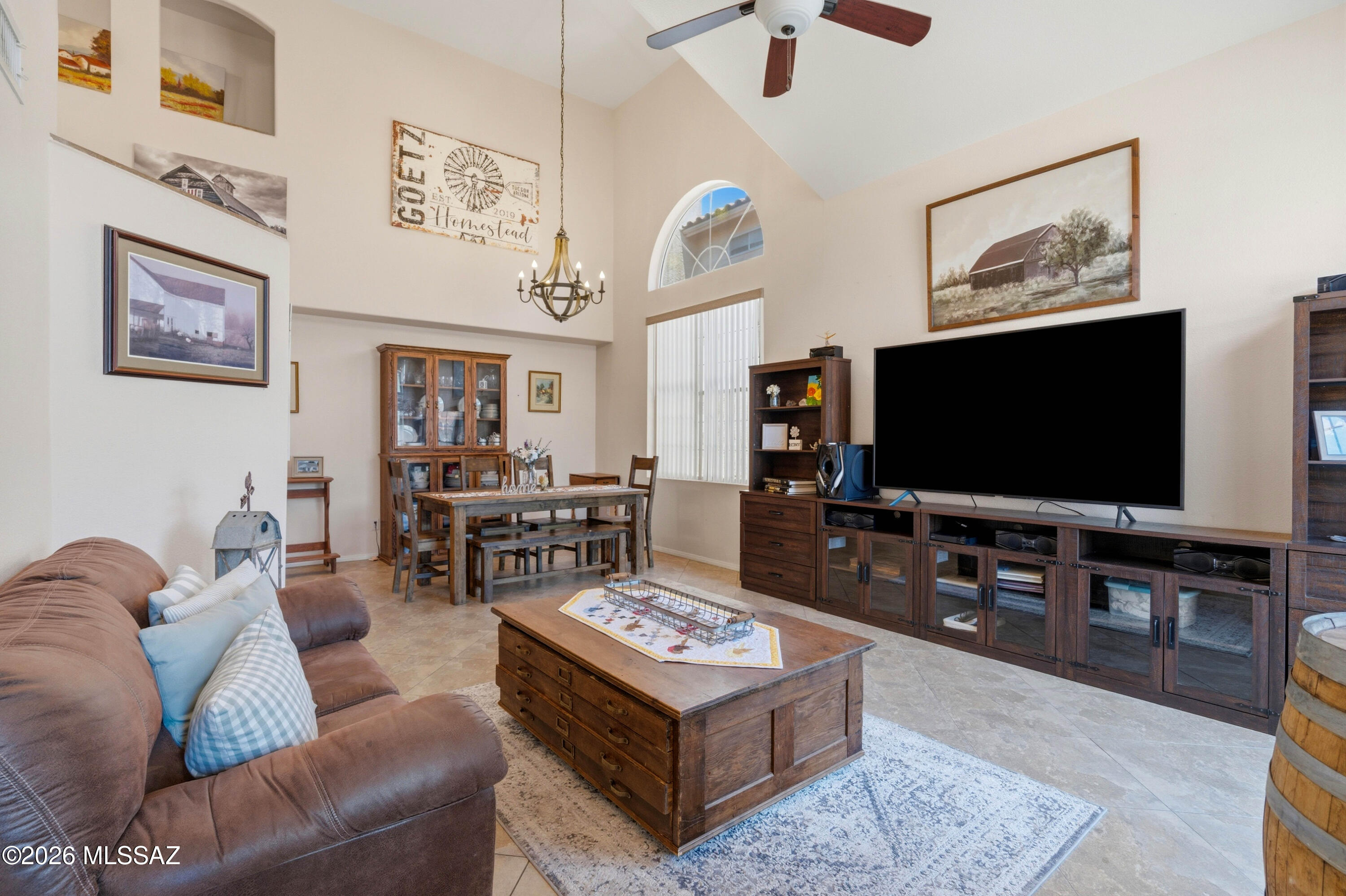 Well-maintained home on a quiet cul-de-sac in desirable Sonoran Heights! This spacious 4-bedroom, 2.5-bath home features soaring ceilings, separate living and family rooms, a cozy gas fireplace, and a granite kitchen with abundant cabinetry overlooking the main living areas. Enjoy mountain views from the landscaped backyard complete with a covered patio, paver entertaining area, and gazebo. Recent improvements include a new HVAC system (less than one year old), newer roof (within the last six years), updated light fixtures, and no polybutylene plumbing for added peace of mind. Complete with a 2.5-car tandem garage for additional storage and convenient East Tucson location close to shopping, dining, and everyday amenities.