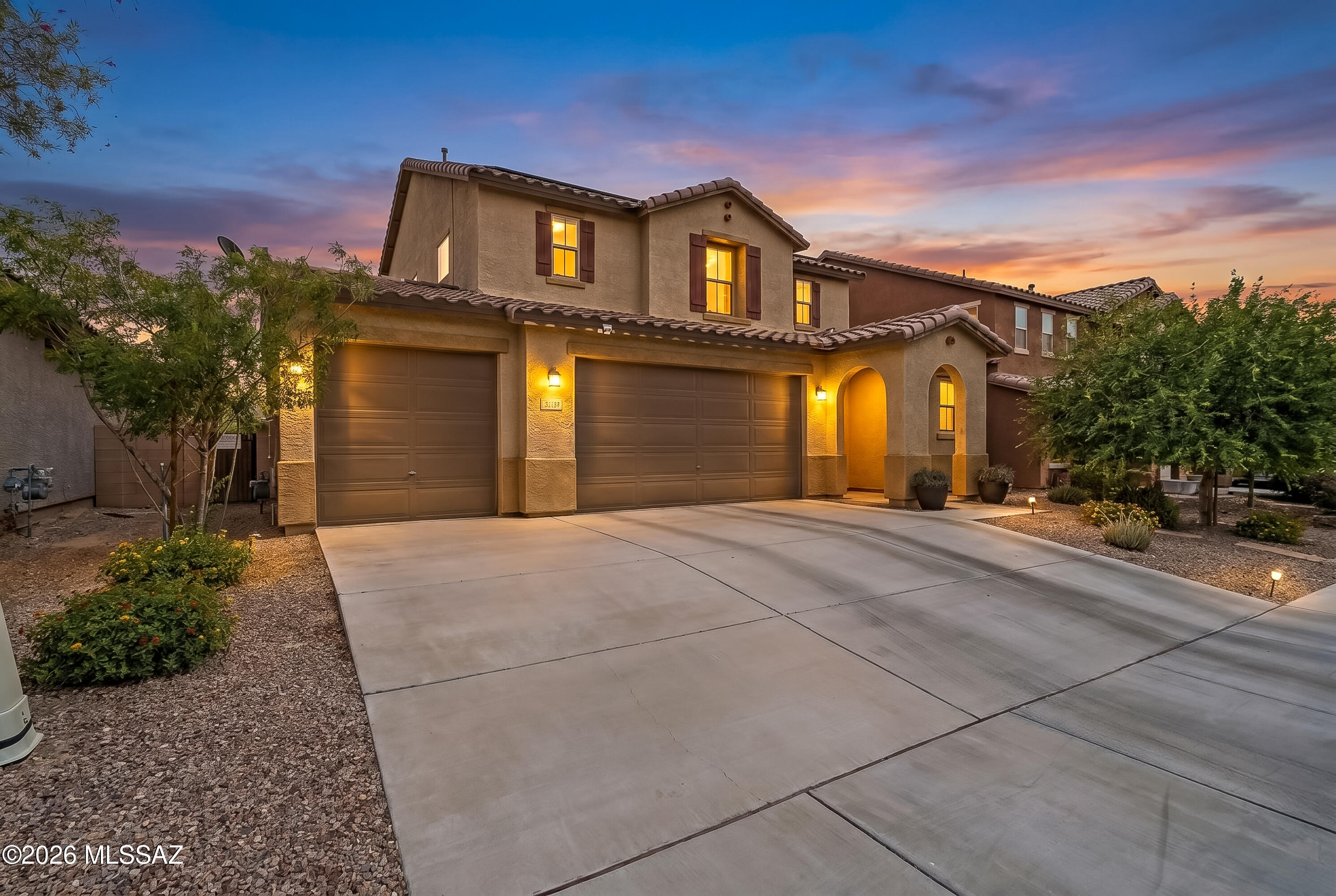 Located in the sought-after master planned community of Gladden Farms, this spacious 4 bedroom, 4 bathroom home offers the perfect blend of comfort & convenience near schools, parks, & shopping. With an open great room floorplan, gourmet kitchen with large island, it features upgraded stainless steel appliances an ideal area for entertaining or family fun. A downstairs suite including a bedroom & full bathroom provides flexibility for guests or multi-generational living. Upstairs you'll find a spacious primary suite along with 2 additional bedrooms plus an open loft perfect for an office/Play area. Upgraded ceramic floor tile in all the right places, plus a 3 car garage! Step outside to enjoy the backyard oasis with sparkling pool, large covered patio, perfect for outdoor Arizona living!