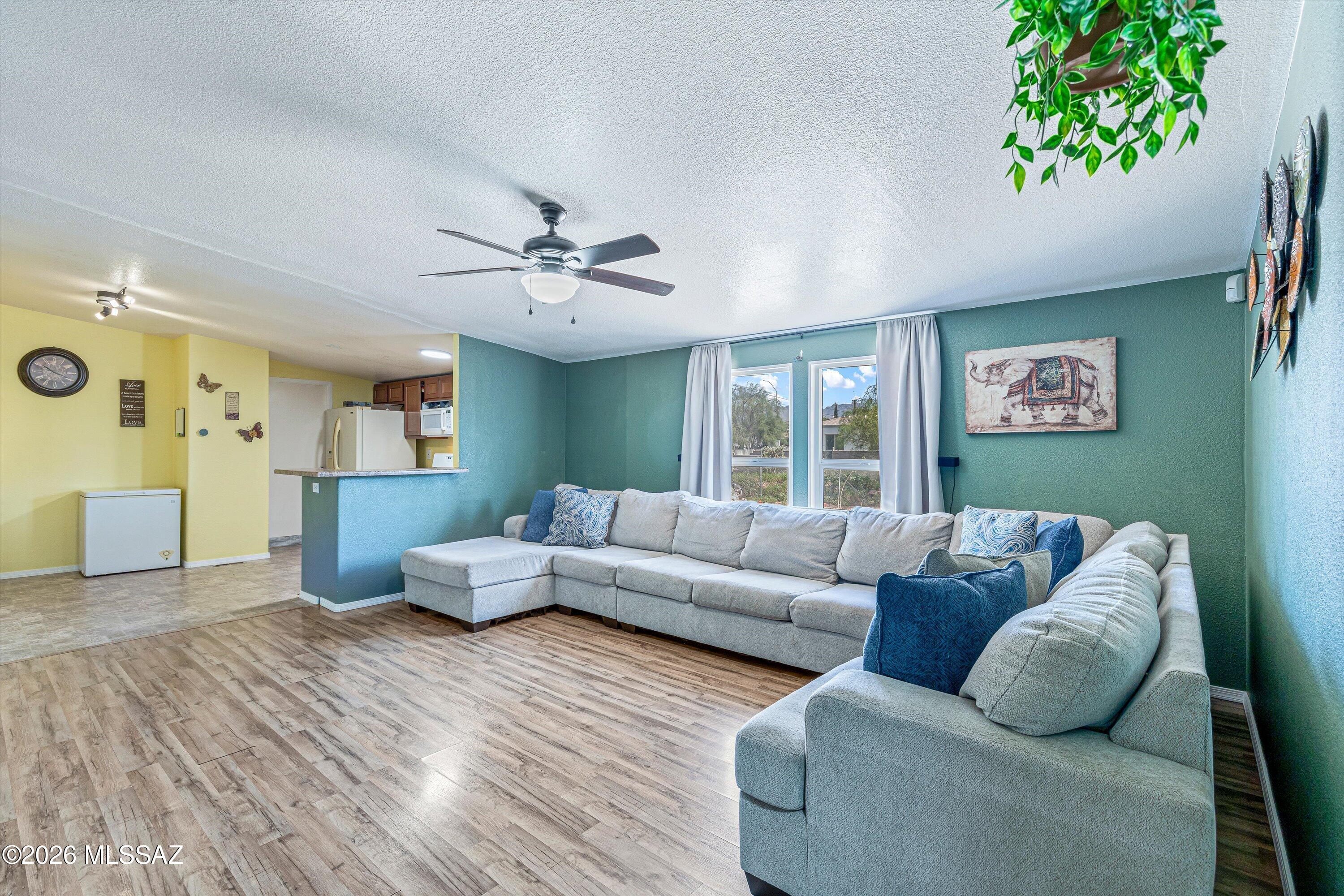 Welcome home to this spacious 4-bedroom, 2-bath manufactured home situated on almost a quarter of an acre! Featuring a desirable split-bedroom floor plan, this home offers plenty of space and flexibility. The fully gated property provides added privacy, while the spacious backyard is a blank canvas with endless possibilities. Create an outdoor entertaining area, garden, play space, or make it your own. Conveniently located just minutes from the Tucson Marketplace, with Costco, Walmart, shopping, dining, and entertainment nearby. Easy access to I-10 makes getting around Tucson a breeze. This home offers so much potential!