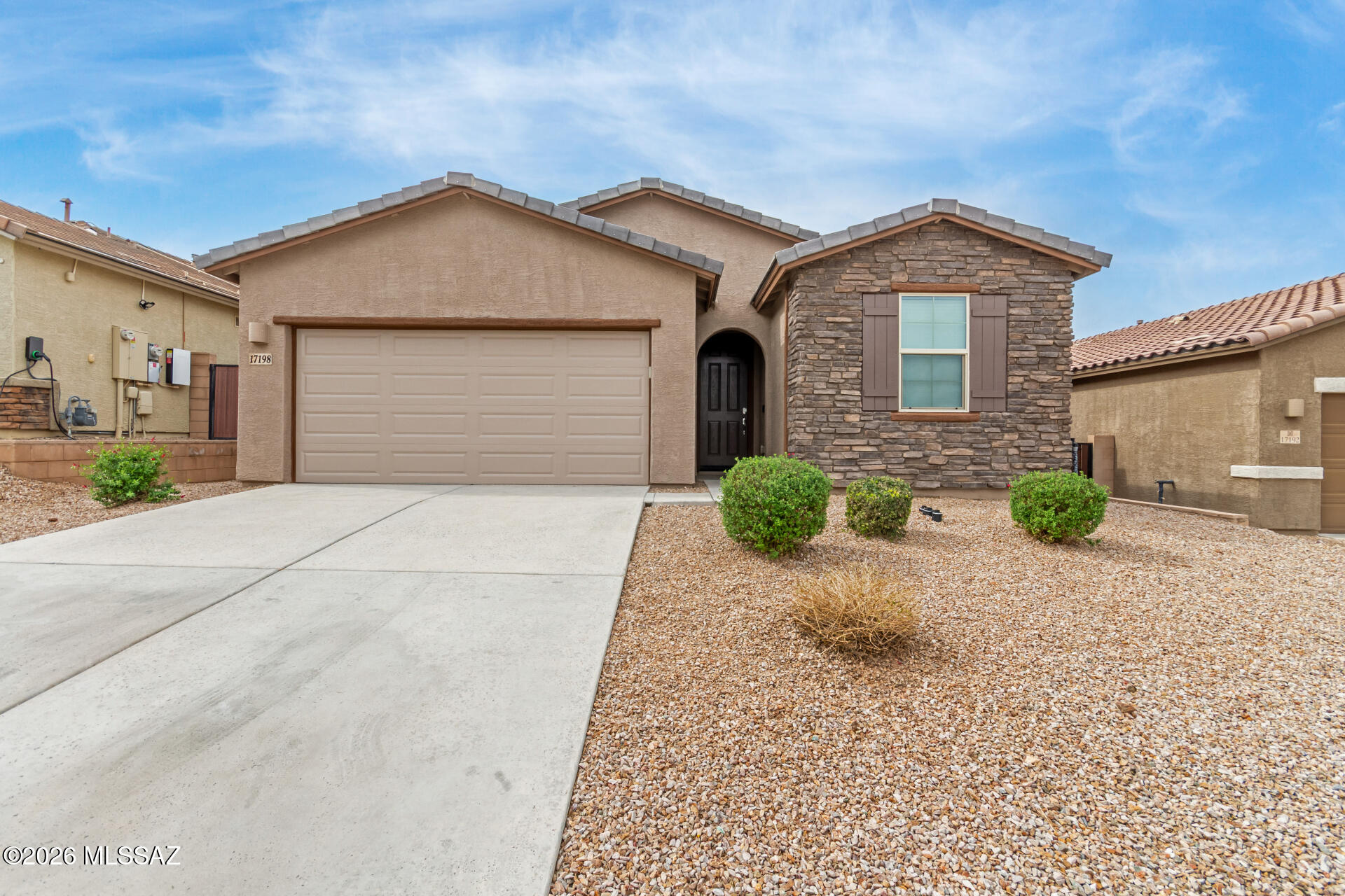 Fall in love with this beautifully well-maintained home offering a spacious 3-car tandem garage with water softener and eye-catching curb appeal. Some of the many features include new carpets in the bedrooms, new washer/dryer & sleek tile floors in this generous open floor plan. The kitchen steals the spotlight also with new LG stainless steel appliances, rich granite counters, upgraded wood cabinetry, large double-door pantry and extra comfort with island and breakfast bar seating. Retreat to the primary suite with plantation shutters, private bath with dual sinks and large walk-in closet. Then step outside to unwind under the covered patio with stunning mountain views perfect for sunset barbecues and peaceful, star-filled evenings. Start creating lasting memories in this dream home!