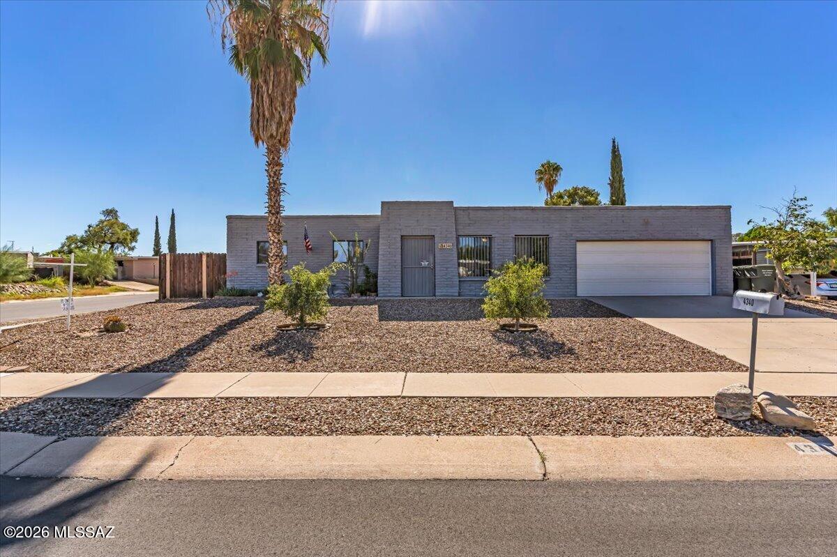 WITH ACCEPTABLE OFFER SOLAR LOAN WILL BE PAID OFF AT CLOSE OF ESCROW. Enjoy the benefits of solar without assuming the existing solar loan. This 4-bedroom, 2-bath East Tucson home sits on a spacious corner lot with NO HOA and a double-gate providing convenient RV, trailer or recreational vehicle parking access. Fresh interior paint, no popcorn ceilings, a newer dishwasher, granite counters and stainless steel appliances in the kitchen, a tankless water heater and Low-E windows add comfort, efficiency and everyday convenience. Washer, dryer and refrigerator convey. Ideally located near Davis-Monthan Air Force Base, Groves Park, Lincoln Regional Park, Pima Community College East, shopping, dining and major Tucson amenities.