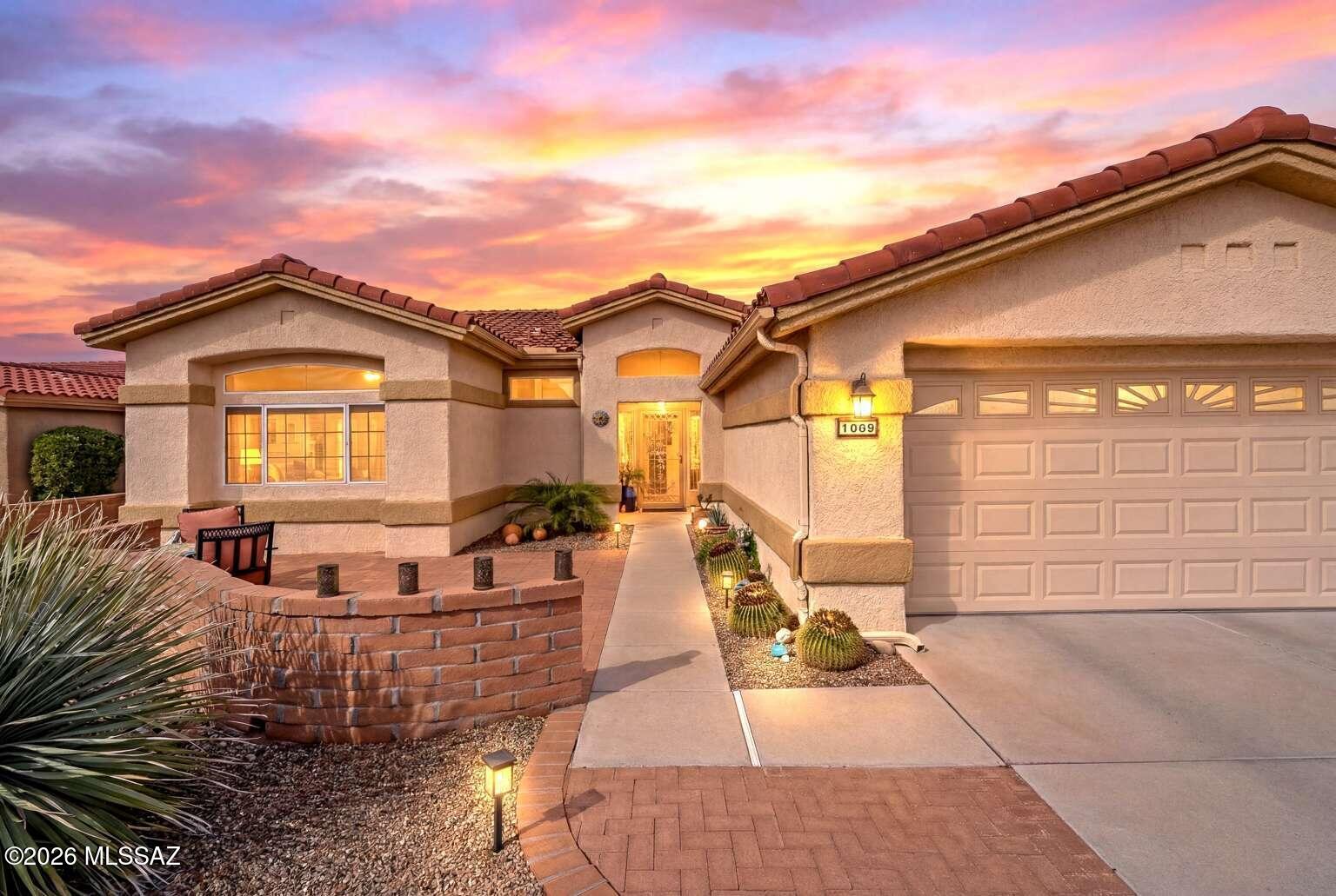Welcome to your beautiful completely remodeled home in Sun City Rancho Vistoso, a 55+ community! Every detail has been thought of in the updating of this open floor plan Windsor model, 2 bedroom, 2 bath home. New Roof, new HVAC, new water heater, all new kitchen with leathered granite countertops, new appliances, newly remodeled bathrooms with the primary bathroom having a roll-in shower for ease of entry, all new plumbing fixtures including all shut-offs, new electrical fixtures including Decora switches and receptacles, new tile flooring and hardwood in both bedrooms. The den area has a built-in electric fireplace and TV (included in sale) on a decorative tiled wall, new interior and exterior paint. The bricked patio has lots of privacy. There's nothing left to do except move in!