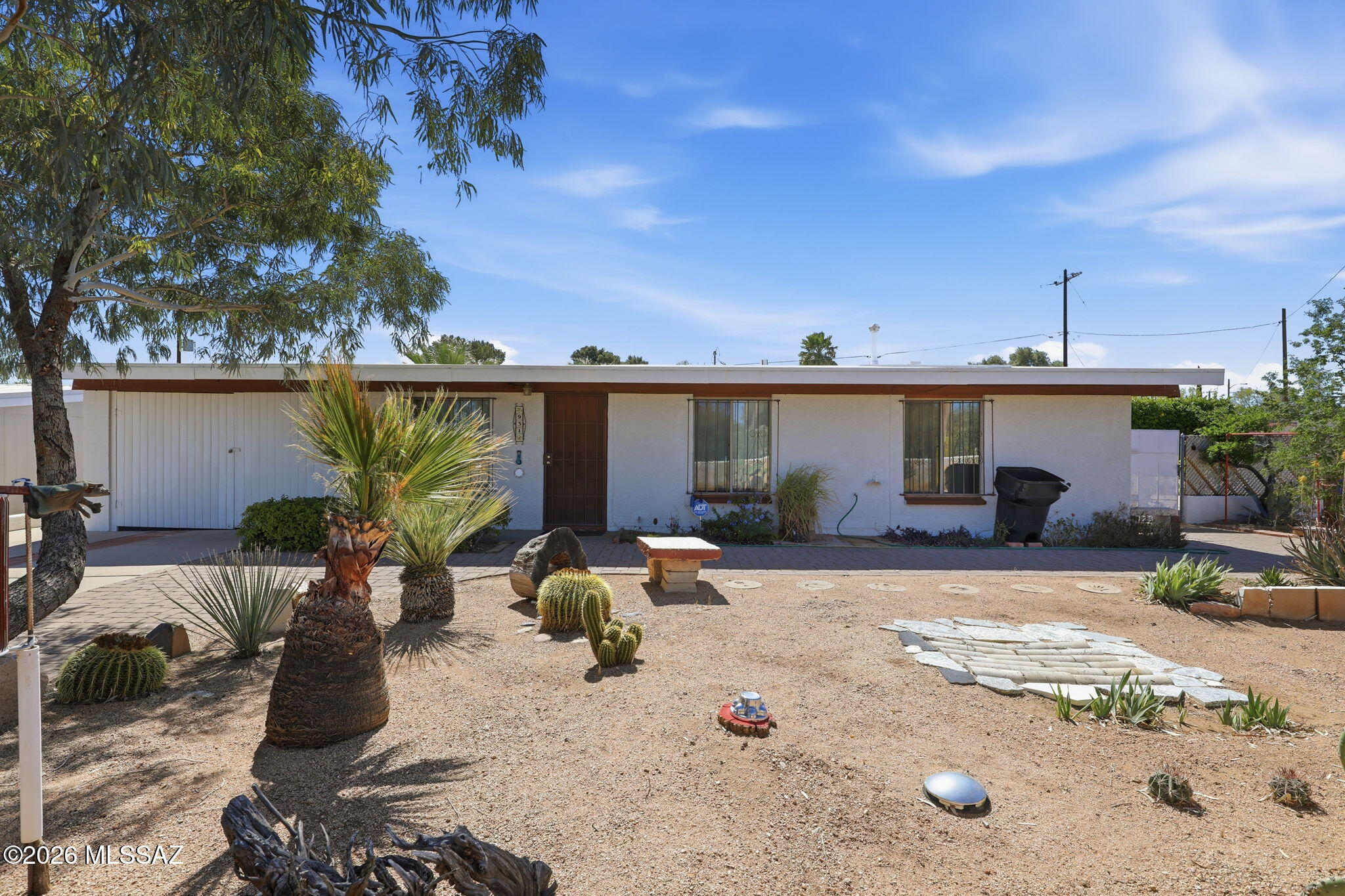 Charming 3 bedroom, 2 bathroom home on a spacious lot in San Manuel, offering peaceful desert living with stunning mountain views to the east and west. The beautifully landscaped yard features classic Arizona desert plantings, along with mature grapevines and a lemon tree perfect for enjoying outdoor living. A large walled backyard provides privacy and a serene setting for relaxing or entertaining. Enjoy the quiet atmosphere, open space, and unique character this property offers while still having room to make it your own. A true desert retreat with charm and potential!