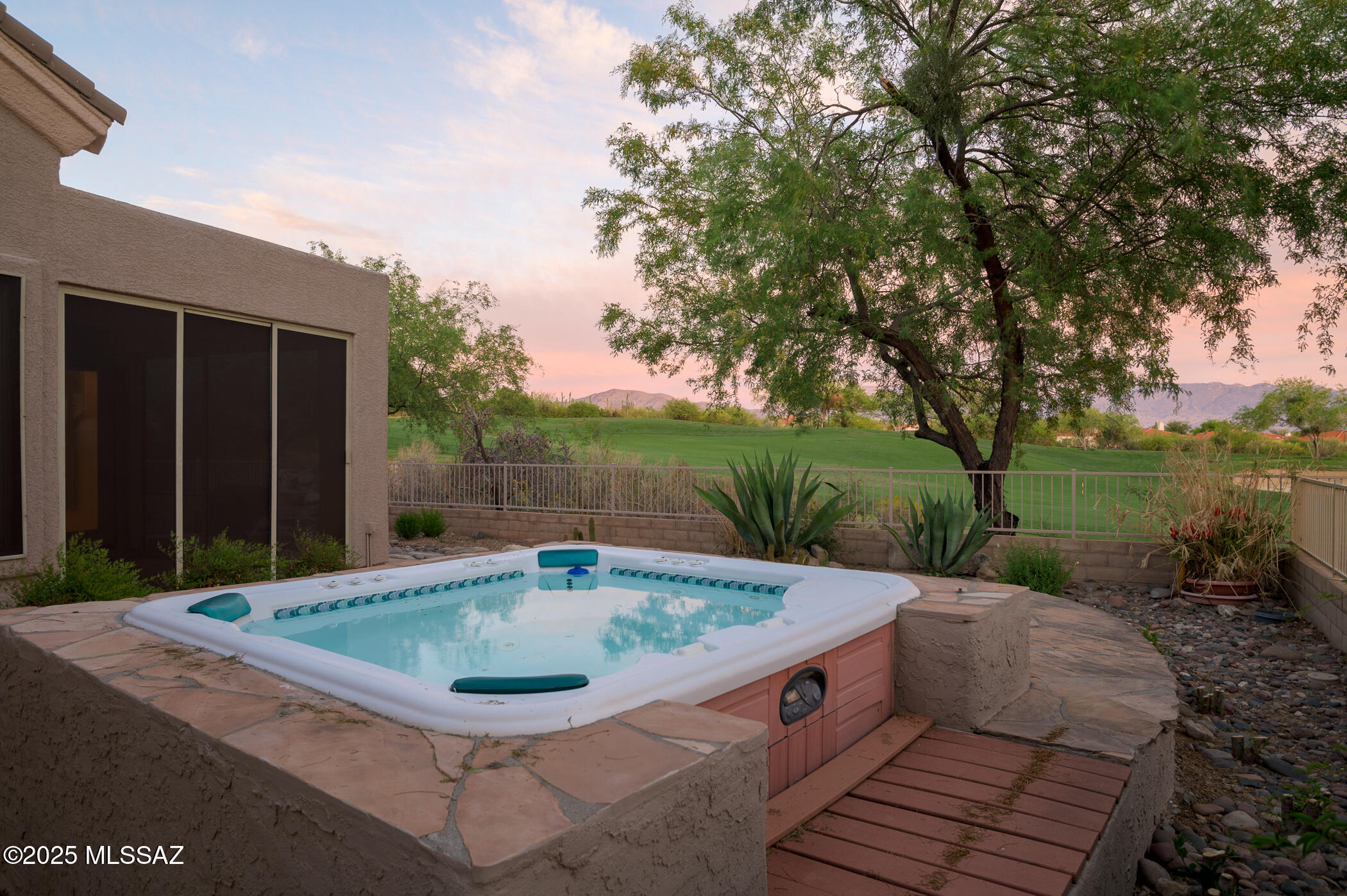 Buy it Now pricing. Sellers's loss, your gain. Best Golf Course View in the Community & Seller Says 'Time to SELL!' Prestigious Sabino Springs 2,809 sq ft house has 3-bedrooms & 3-bathrooms offers a scenic landscape with tranquil setting & NO Carpet. Surrounded by lush greenery and a spacious exterior. Showcases architectural creates a peaceful outdoor space with an inviting patio & Spa and gorgeous views. Two en-suite bedrooms upstairs and another downstairs with it's own entrance to the ( Wellness/workout room, Office, Maybe a studio?) The interior boasts abundant natural light, a spacious layout, and a see-through fireplace feature &  Mountain and City lights provide a serene and relaxing ambiance for all. Come and see for yourself! & Tile flooring throughout & don't forget the Arizona room. The charming exterior and inviting entryway led to lush landscaping with built-in spa to relax after working out in the communities' facilities or swimming in the clubhouse pool, or after playing some worldclass golf. With contemporary architecture & a 24-hour manned gate for added security and privacy, this is the IT property - Come see for yourself!