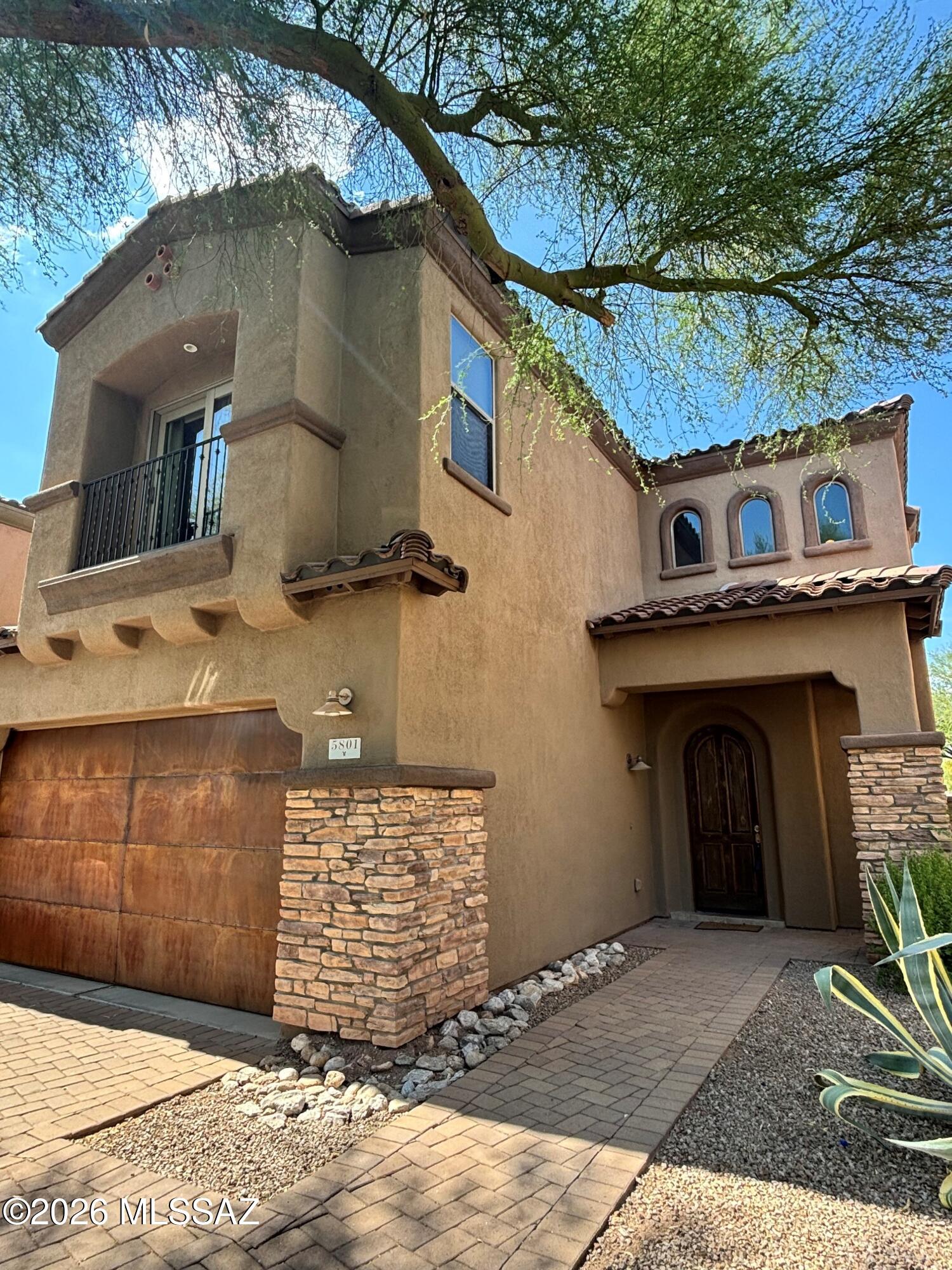 Gorgeous home in the desirable Paloma Ridge gated community in the foothills, with Spectacular views of the Catalina Mountains. It was a former AF Sterling model, with customized designer details and finishes. Enjoy the Gourmet kitchen boasts Viking SS appliances (including a large wine refrigerator) with 6 burner gas cooktop, Fisher Paykel dishwasher, customized alder cabinets with 42 inch uppers; slab granite countertops & mosaic glass tile backsplash. Take the decorated staircase to the 3 oversized bedrooms upstairs OR use the convenient ELEVATOR to get there! Enjoy great entertaining in the resort style backyard with heated pool & spa, waterfall, outdoor kitchen, fireplace & outdoor speakers. It is a wonderful location: close to shopping, restaurants, hiking and golf.