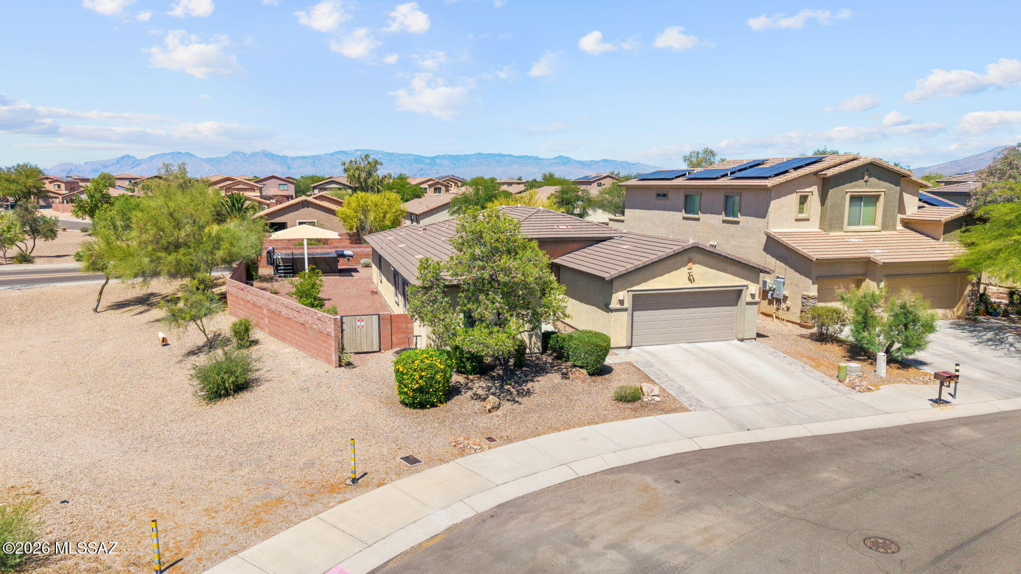 Assumable 3.3% loan available! Enjoy energy efficiency, functional living, and a layout that simply works. Set on a premium lot, this well-maintained single-story offers privacy, space, and smart upgrades. The open-concept design features a flexible den or dining area, spacious great room with ceramic tile, and a split-bedroom floorplan. The kitchen includes granite counters, stainless appliances, and a rare gas range. A tandem 3-car garage adds flexibility for storage, hobbies, or extra parking. Step outside to a backyard built for year-round use with a covered patio, extended side yard, and a dedicated pad with 220V for your 1800-gallon Cal Swim Spa. Upgrades include spray foam attic insulation, newer carpet, quiet-seal garage door, and a brand new Essency water heater and softener. Located in Sycamore Park Village within the Vail School District, this home also offers easy access to nearby parks and walking paths. A rare opportunity combining lifestyle, location, and long-term value. 3.3% Assumable loan available.