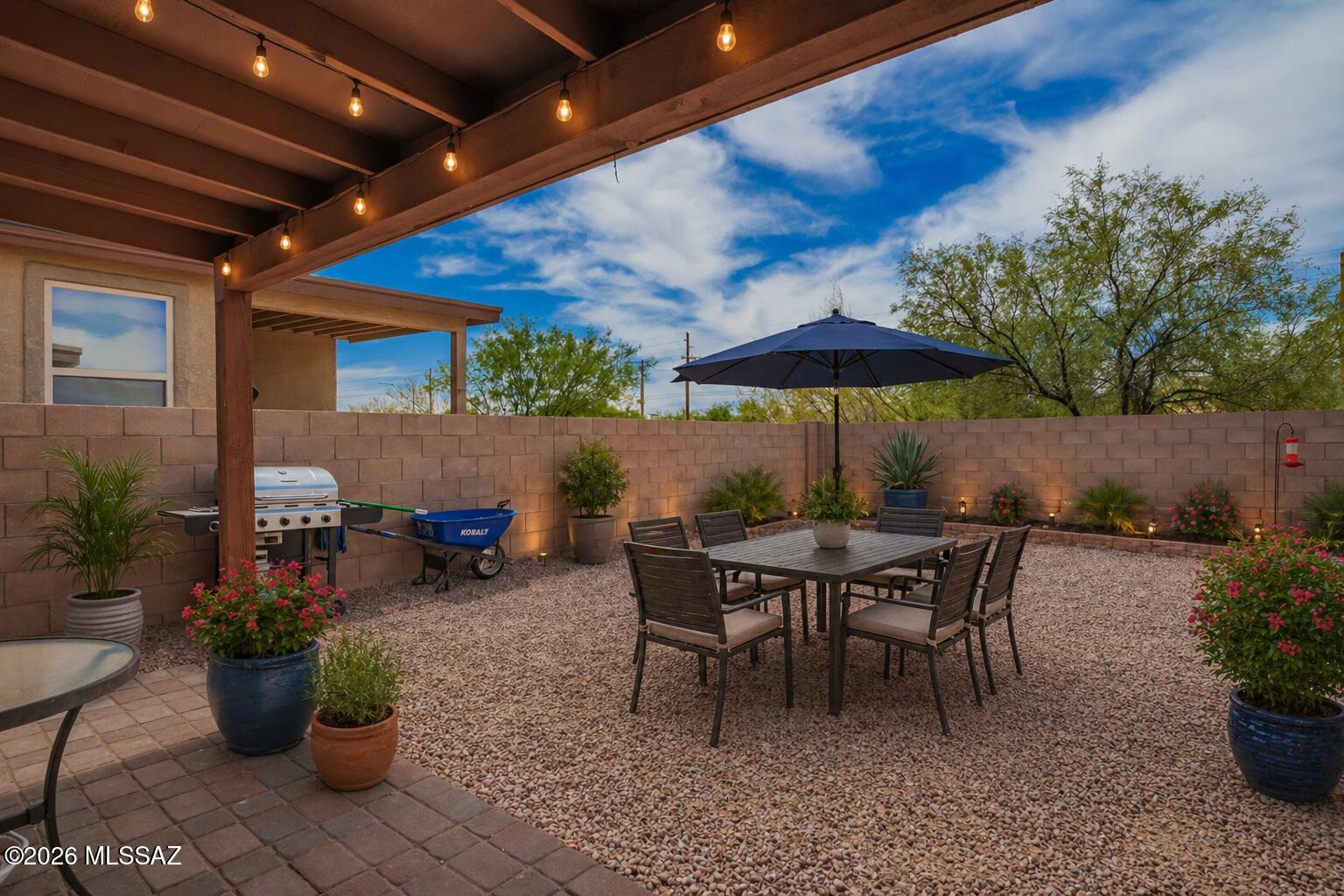 Welcome home, where comfort, style, and Arizona living come together at the end of a quiet cul-de-sac in desirable Southwest Tucson! Built in 2018 and freshly updated with new interior paint and stylish flooring, this move-in-ready home is ready for its next adventure. 
Step inside to a bright, open-concept floor plan that's perfect for everything from cozy movie nights to lively gatherings. 

The spacious kitchen is the heart of the home, featuring abundant cabinetry, plenty of prep space, and a seamless flow into the dining and living areas--so you're always part of the conversation. 

When it's time to unwind, retreat to the private primary suite complete with a walk-in closet and en-suite bath. Additional bedrooms offer endless possibilities for guests, a home office, hobby room, or workout space.

Outside, you'll find your own slice of the Sonoran Desert! The fully walled backyard is low maintenance, backs to open space with **no rear neighbors**, and provides the perfect setting to relax, entertain, or soak in Tucson's spectacular sunsets.

With desirable north/south exposure and a location just minutes from shopping, dining, parks, schools, and easy freeway access, this home checks all the boxes. Whether you're buying your first home, looking for a winter getaway, or ready to simplify without sacrificing comfort.