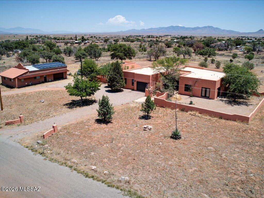 Spacious Santa Fe home in a quiet neighborhood. 5,000' elevation, high-desert grasslands & oak trees, minutes away from town center, wineries, Nat'l Forest and so much more. Home features 3 Bdr & 2 bonus rooms, one of the bonus rooms can be made into private guest quarters or used for extra income as a rental, Primary suite is very spacious w/walk-in closet, new windows, engineered wood floors & newly remodeled Bath. Ceramic tile throughout main house, High ceilings, Kitchen Island, tile countertops, SS appliances, & lots of extra storage, pantry, & huge laundry room. Outbuilding can be made into a guest house, A 1,200 Sf detached Garage/Shop, 6.3 kW Solar system, it powers the whole house to keep electric bills very low! New steel fencing for horses or farm animals, Come see this gem!