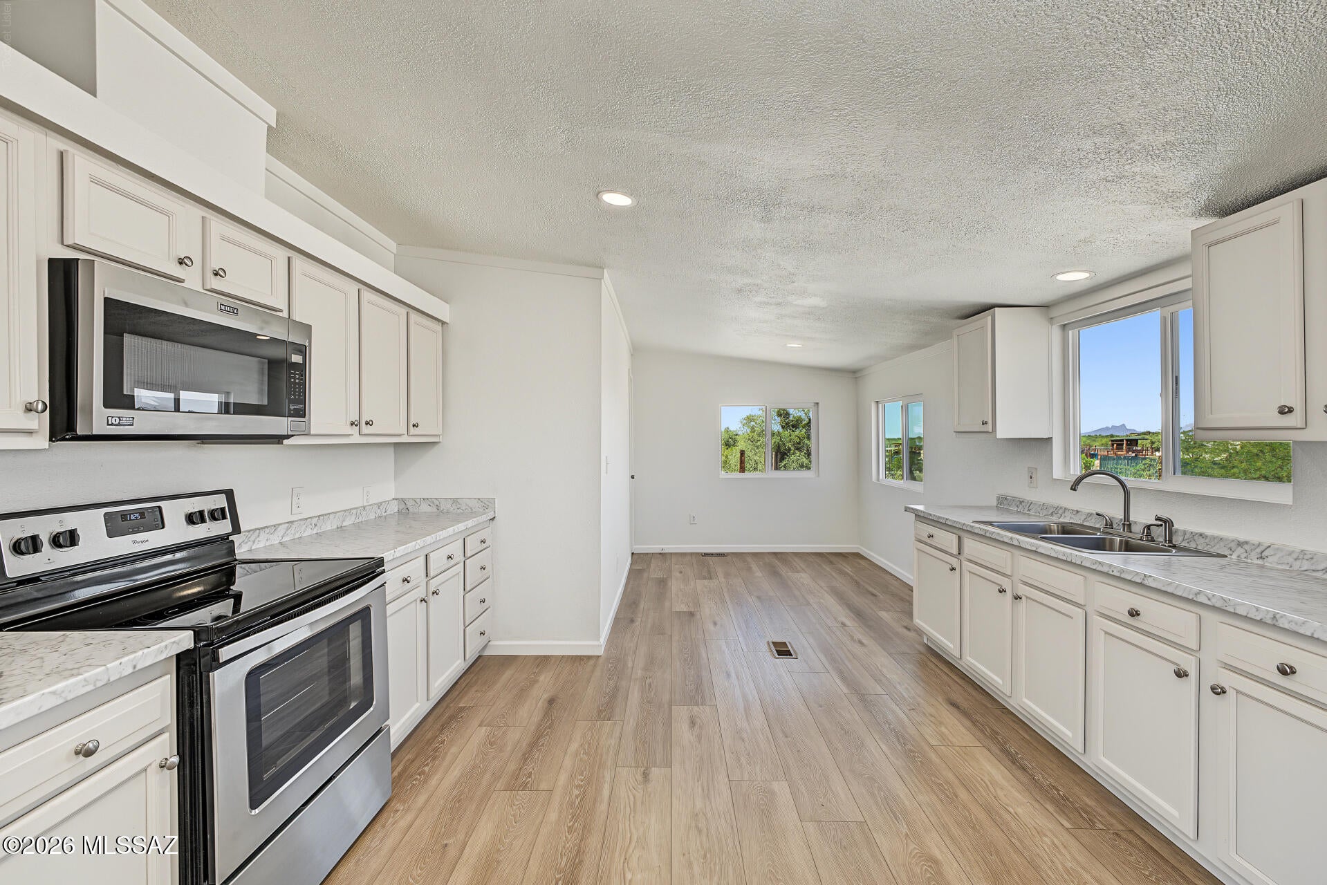 Great opportunity for affordable homeownership! Spacious manufactured home situated on a full acre in Marana. Features 4 bedrooms, 2 bathrooms.  Zoned for horses and perfect for those seeking a relaxed rural lifestyle. A must-see!