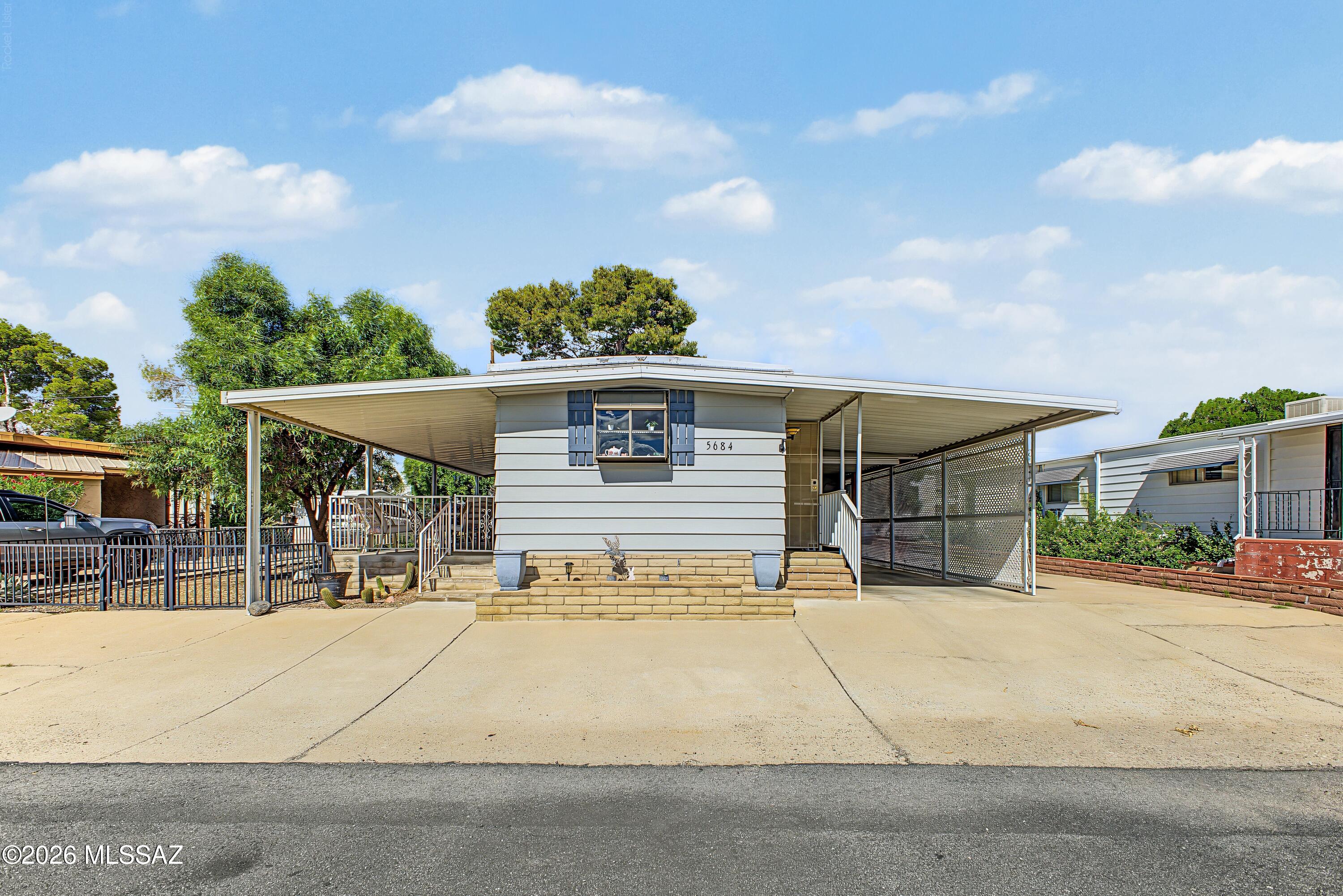 Welcome home to this charming 2-bedroom, 1-bath home located on a huge lot with a covered patio and parking. BRAND NEW A/C and furnace adds to the benefit of making this your next home. Step inside to a spacious kitchen with plenty of counter and cabinet space. Entertain in the dining room off the patio. The layout offers a large living room with comfortable bedrooms and an easy flow throughout.   Outside, the huge lot gives you room to garden, entertain, or simply enjoy the open space, and the included shed adds handy storage for tools and toys. Whether you're a first-time buyer, downsizing, or looking for a smart investment, this one delivers comfort, space, and value. Schedule your tour today.