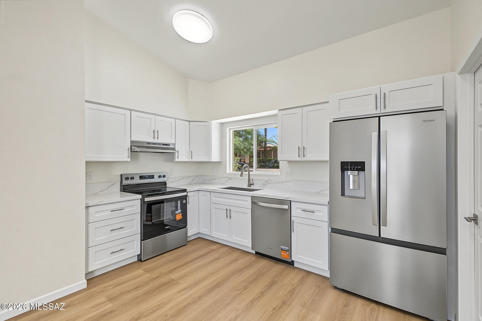 A beautifully remodeled 3-bedroom, 2-bath townhome where modern updates meet a serene natural setting. Move-in ready, this home offers the opportunity to enjoy a fresh, updated interior without the hassle of taking on a renovation. The thoughtfully updated interior features new flooring, dual paned windows, a remodeled kitchen, refreshed bathrooms, and beautifully updated bedrooms. The result is a bright, comfortable home with modern appeal and a layout designed for everyday living. One of the home's standout features is the private-feeling backyard overlooking a natural riparian area. Enjoy your morning coffee, dine outdoors, entertain friends, or simply relax while taking in the peaceful views and surrounding greenery.