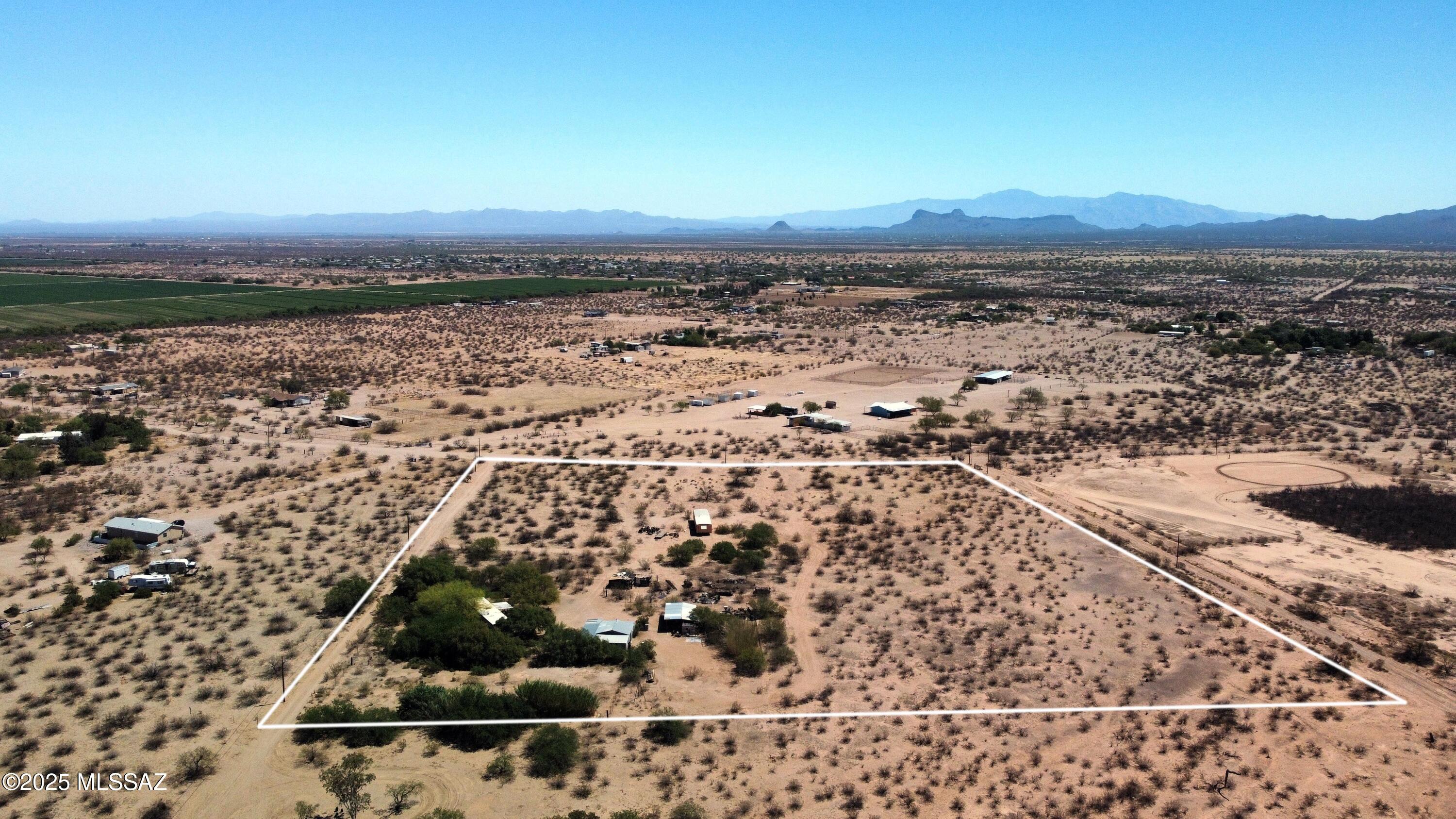 Come enjoy the space, privacy and possibilities that come with this peaceful 11+ acre property. The flat parcel offers plenty of room for horses, chickens, recreational toys, gardens or simply enjoying having room to spread out. All utilities are available, including a community well share.
A 2 bedroom, 1 bath manufactured home is already on the property and conveys with the sale, giving you a place to call home while you make plans for the future. A spacious workshop with 200-amp power provides plenty of room for projects, hobbies, storage or work.
Located on a corner for convenient access, the property also offers flexibility for the future. Zoning allows for 2nd home. Whether you're dreaming of building a custom home, adding another manufactured home, keeping animals or creating your own little slice of country living, there are plenty of options here.
Bring your ideas, your imagination and enjoy the freedom that comes with having space to make this property your own!