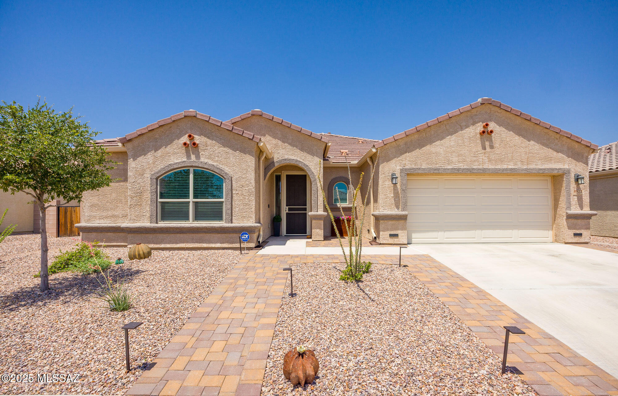 Upgrades galore in gated Saguaro Springs 55+ community.This 1,730 sq.ft 2-bdr/den home is packed w/ recent improvements inside & out.The front entry features pavers, directional lighting & brand new security door.Step inside to a completely new kitchen with Samsung smart appliances, stylish backsplash, under cabinet lighting, water filtration system, soft closing cabinets, beverage fridge & large center island.Thru-out the home all new ceiling fans, custom paint, new modern lighting, new baseboards & updated door trim.The guest room has new lighting & custom closets w/dresser.Guest bath shines w/new sink & countertops. Primary suite has new paint, window coverings, upgraded new ceiling fan & custom closet dresser.Spacious laundry room has new custom cabinets.Garage offers new epoxy floors