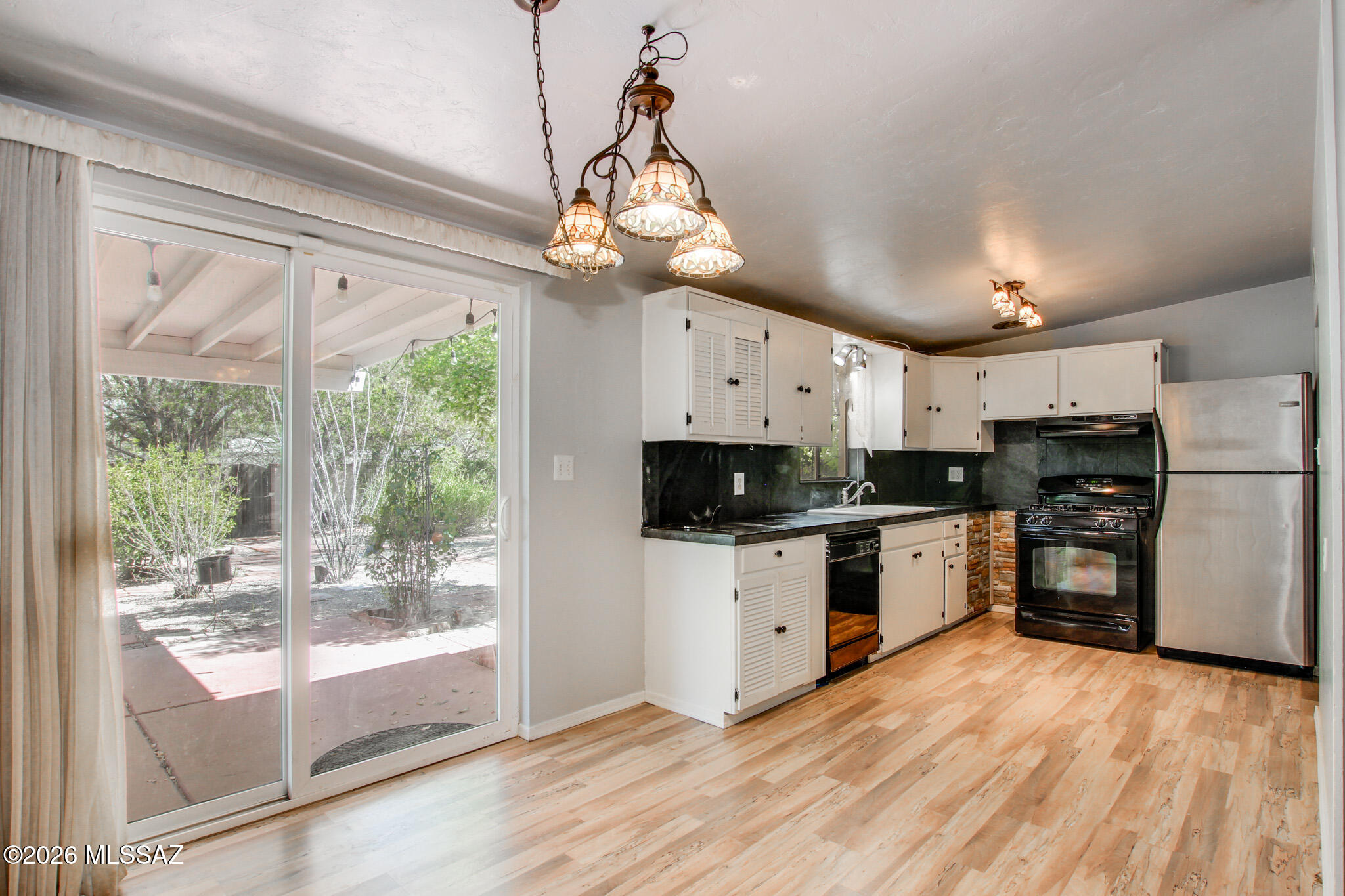 Welcome to 2019 S Avenida Del Sol in East Tucson's established Terra Del Sol area. This 3 bedroom, 2 bathroom home offers 1,092 square feet of comfortable living on a generous lot with mature trees, a fruit tree, and outdoor space that adds warmth and character. Inside, the layout is practical and easy to enjoy, while the new water softener adds everyday value. Close to parks, shopping, dining, and major East side routes, this home offers location, charm, and opportunity. Seller is offering $4,000 toward buyer closing costs. With easy access to major roads and popular east side amenities, this home is a great opportunity for buyers looking for a well located property with comfort, value, and room