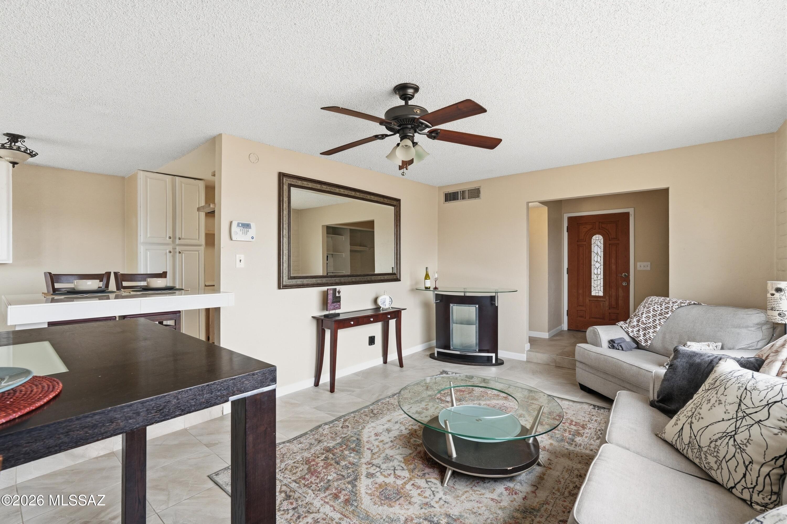 RANGE PRICE 289K-300K. Tucked away in a quiet cul de sac in the popular Stonegate community, this well-loved home offers 4 BR and 2 full BA and has a gorgeous mountain view. One of the most affordable 4BR SFRs of this size on the East side & no road noise! Much has been remodeled or replaced in the last few years, including the big ticket items: new roof, electric panel, H2O heater, windows, etc.  Kitchen has b-fast bar, high-end shelving, & beautiful marble countertops you can likely save to complement your choice of new kitchen cabinets. Or simply replace the cabinet and drawer fronts with your favorite style.  The HUGE yard is your pallette, get creative! No house directly behind allows for a nice private spot with a view. No HOA & low taxes. Close to Pima College, the library, & parks!
