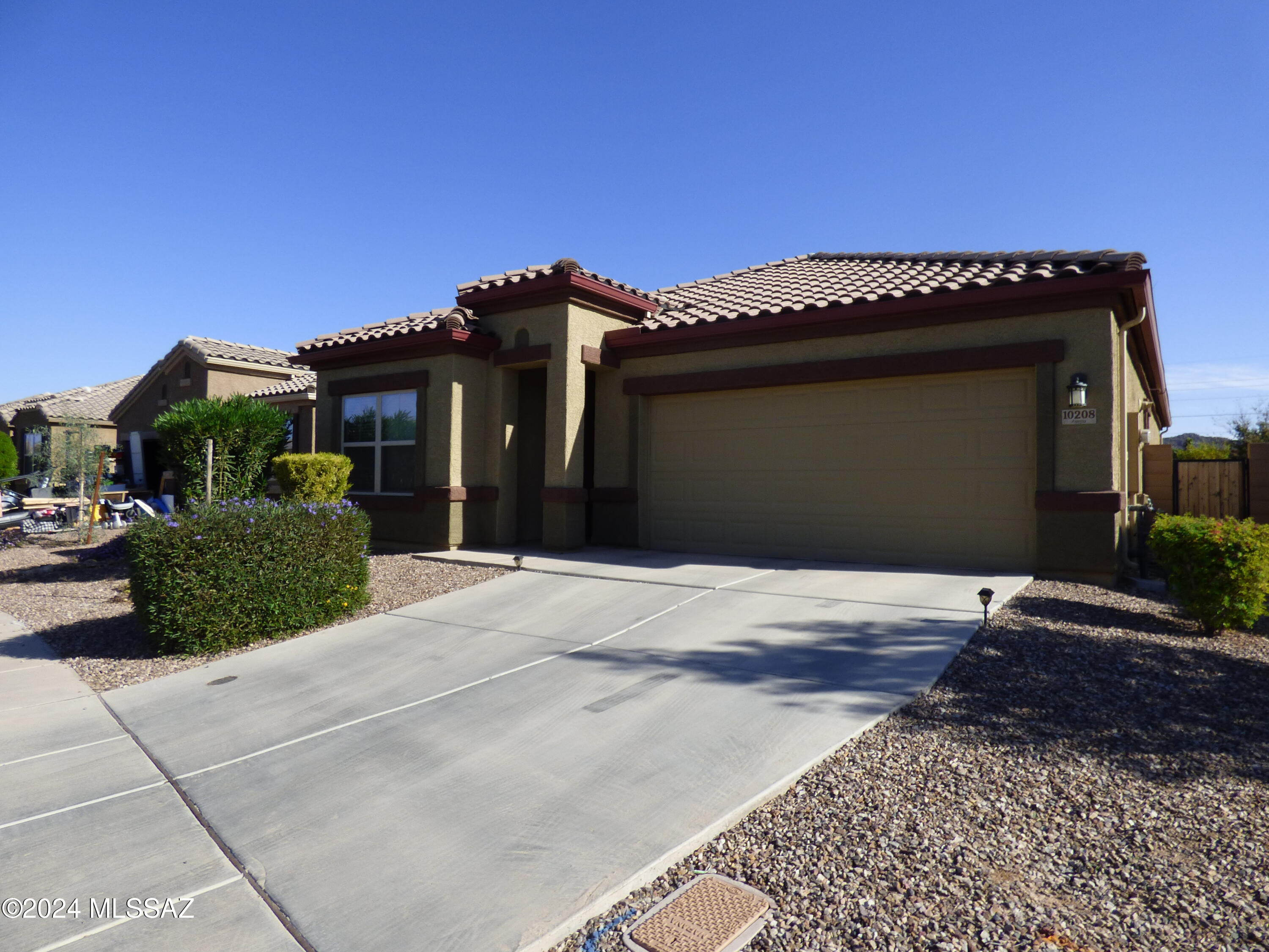 Beautiful 4BD/2BA Home in Marana-Saguaro Bloom. Has open floor plan, kitchen w/SS appliances, center island/breakfast bar, large dining area and large laundry room with washer/dryer. 
Enjoy the covered patio and beautiful backyard with pavers and artificial grass area. 
Saguaro Bloom offers many amenities including community splash pad, pools, community center and gym facility.