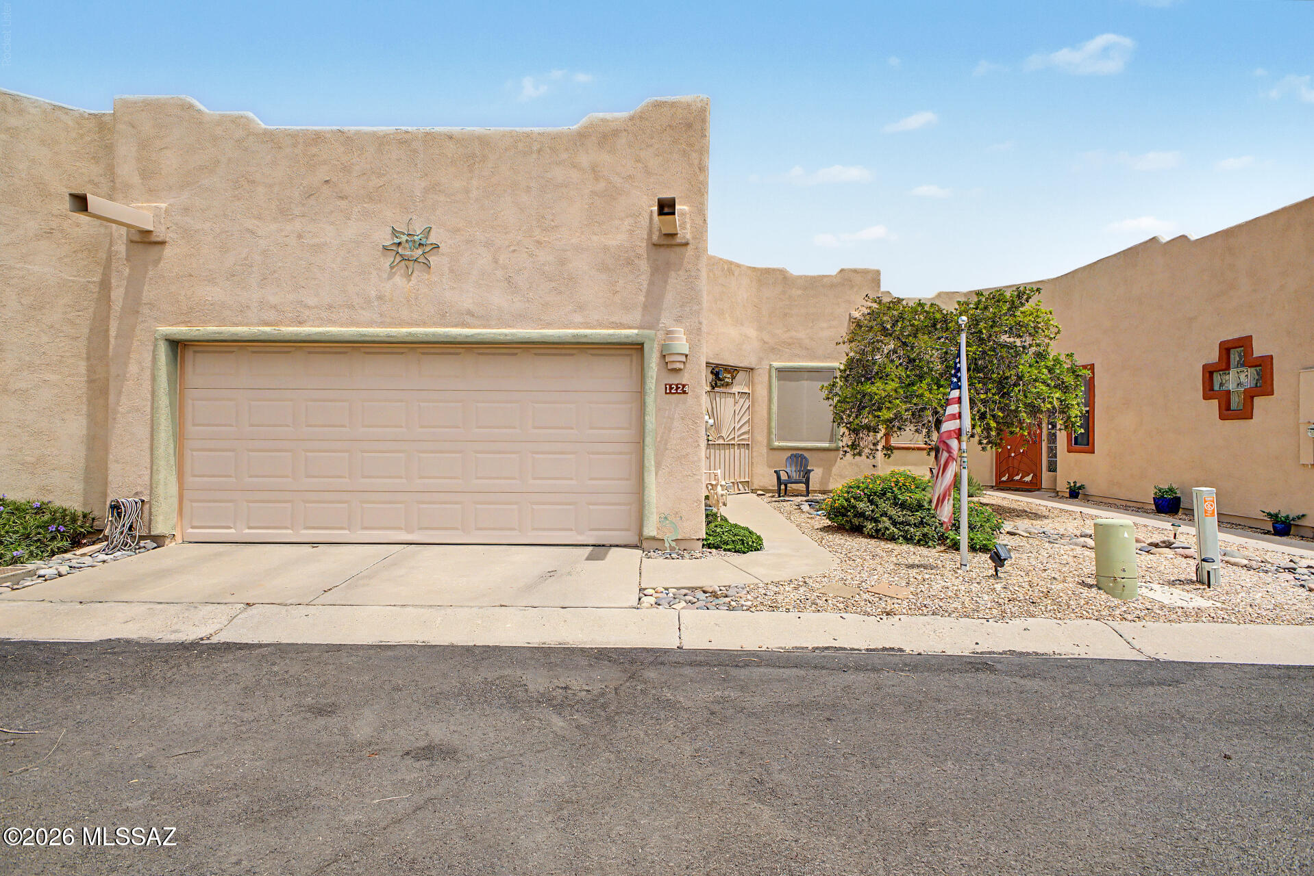 Welcome to this charming 2-bedroom, 2-bath townhome in Green Valley, complete with owned solar and inviting indoor-outdoor living spaces. The bright, open living room features high ceilings, skylights, a contemporary color palette, blinds, and attractive wood-look flooring. The well appointed kitchen offers Corian countertops, recessed lighting, wood cabinetry, stainless steel appliances approximately three years old, and an adjacent nook that serves as a small office or casual dining space. The spacious primary suite features a sitting area, private bath, and walk-in closet. Relax year-round in the enclosed sunroom or step outside to the low-maintenance backyard with pristine artificial turf. Additional highlights include a water softener, and furnishings are available for added convenience. Make this wonderful Green Valley home yours today!