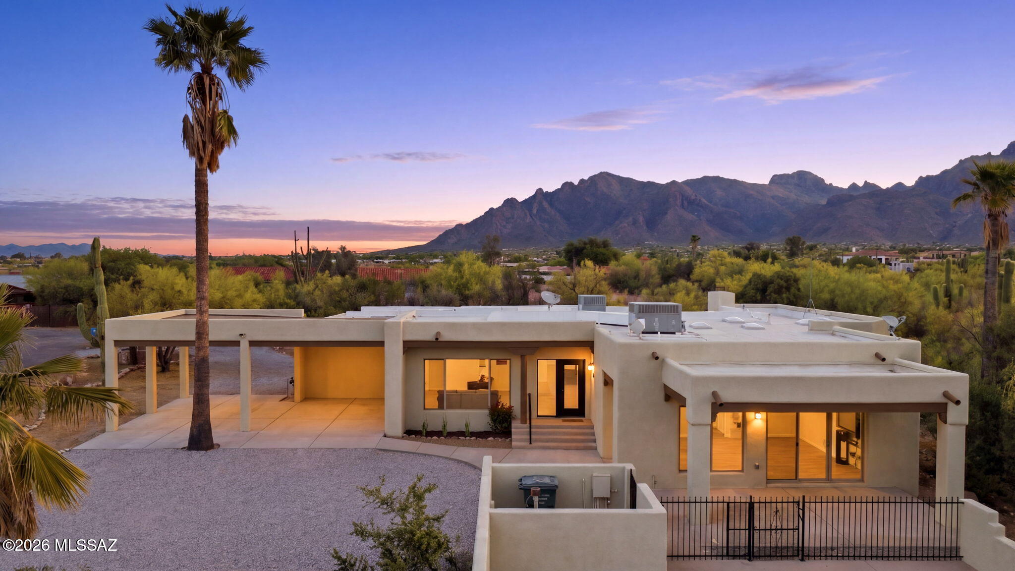 Nestled on a private cul-de-sac on the highly sought-after north side of town, this fully renovated estate delivers the perfect blend of luxury, space, and breathtaking mountain views. Set on a full acre, this property offers the privacy you crave with the convenience you need. Step inside to discover a thoughtfully designed floorplan featuring 4 bedrooms and 4 full bathrooms, including two en-suite bedrooms ideal for guests or multi-generational living. The home lives large with a formal living room, an expansive second family room or game room, and seamless indoor-outdoor flow. At the heart of the home, a stunning gourmet kitchen opens beautifully to the main living spaces, complete with high-end finishes, ample storage, and a butler's pantry that elevates both everyday living and entertaining.

The primary suite is a true retreat, featuring a cozy fireplace, spacious walk-in closet, and a spa-like feel designed for relaxation.

Outside, the lifestyle continues with a sparkling heated pool and spa, surrounded by serene desert landscape and unobstructed mountain views. A half-circle driveway welcomes you in, while two extended covered parking spaces provide both function and flexibility.

Additional highlights include a large laundry room with built-in shelving and folding counter, generous storage throughout, and a setting that offers rare privacy without sacrificing accessibility.

This is more than a home, it's a private desert retreat designed for elevated living.