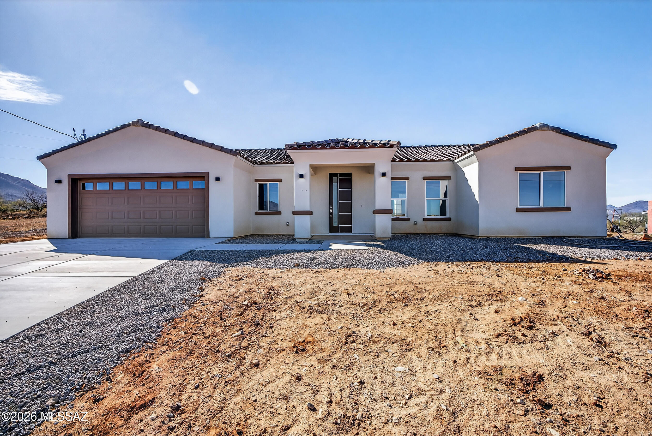 2026 NEW CONSTRUCTION! Spacious 3BD/2BA home offering 1,621 SqFt of living space on a 0.54 acre lot with no HOA. Open kitchen features marble countertops and stainless steel appliances including refrigerator, range, dishwasher and microwave. Both bathrooms offer walk-in showers, floating vanities and marble countertops. Enjoy mountain views and beautiful sunsets from the front and back yard. Seller is related to listing agent.