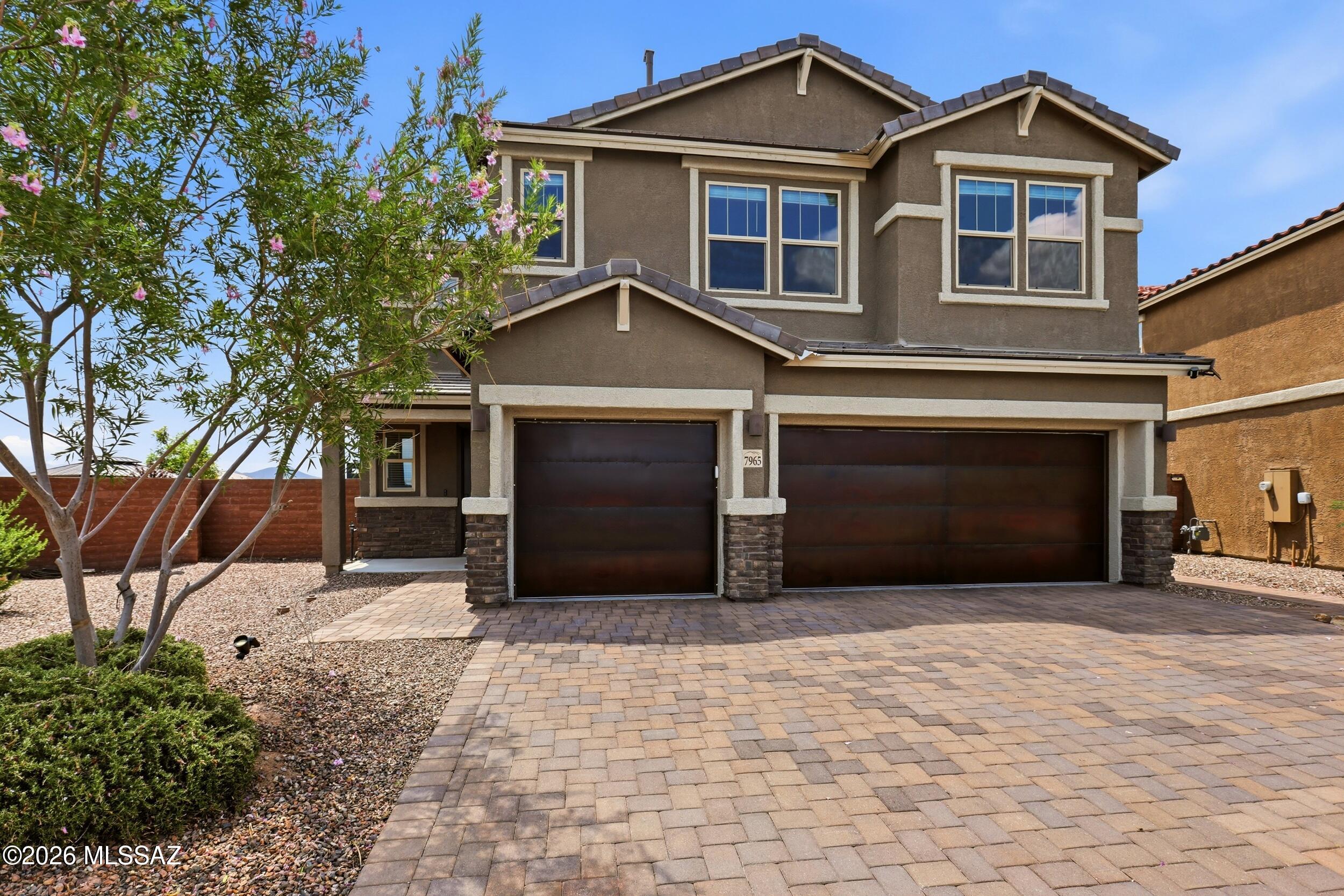 Skip new construction pricing and dirt yards-own a spotless, 3 year old highly upgraded home in Rocking K with a fully finished yard and beautiful pool.  Located on premium ridgetop lot, just under 1/4 acre in Sky Village with mountain views .More than 3000 square feet, with granite/quartz and upgraded kitchen cabinets. Property features Whole home water filtration, alkaline Reverse Osmosis and air scrubber. Prewired for ceiling fans, surround sound, patio speakers, solar power, and plumbed for solar pool heat. Epoxy garage floor, garage ceiling storage, salt water pool and nearby Saguaro Creek K-8. .....