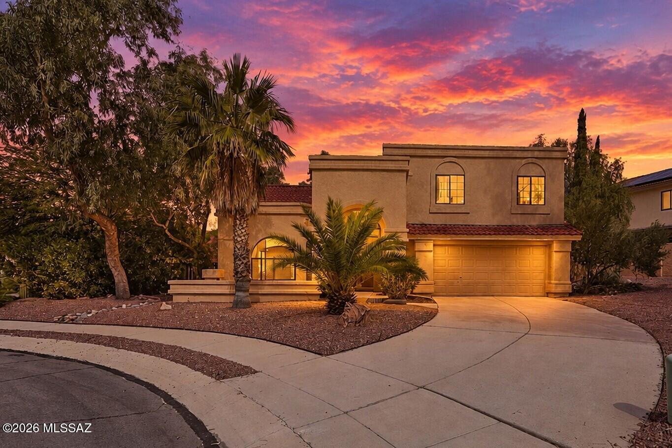 Outstanding value and Southwest charm in this light-filled 3BR/2.5BA, 2,009 sqft home in sought-after Copper Creek. Quiet cul-de-sac location with bedroom mountain views in both directions. Light and bright throughout, the dramatic high-ceiling front living room with exposed wooden beam fills with sunlight through the day.  All tile floor living spaces downstairs, and brand-new carpet upstairs.  Kitchen opens to family room with fireplace and pool views, plus a sparkling pool on the west side for longer swim seasons. Short walk/bike to Naranja Park.  Excellent value in a well established neighborhood with sidewalks, park, and easy access to the best of Oro Valley.  See floor plan and extended description. Welcome to this inviting Southwest-style home in the heart of Copper Creek, one of Oro Valley's most established and desirable neighborhoods.  Sitting at the end of a small quiet cul-de-sac, it delivers privacy while being close to the very best of Oro Valley.  The front living space features high vaulted ceilings with a large wooden beam and updated lighting, creating a bright, open, and expansive feel.  Multiple patio doors connect the open-concept living areas to the backyard and pool, flooding the home with natural light and making indoor-outdoor a real part of everyday life here.  

The great U-shaped kitchen offers a practical "work triangle" and opens directly to the family room, with a sink positioned perfectly for keeping an eye on the pool. The family room includes a wood-burning fireplace, two patio doors, and convenient access to a downstairs half-bath with a large linen/storage closet. All living areas downstairs feature tile flooring for easy maintenance and a clean, modern feel. Upstairs bedrooms feature all brand new carpeting.  T large primary bedroom suite welcomes you with double doors, high ceilings, and an upgraded ceiling fan that enhance the sense of light and space. The primary bath offers double sinks, a garden tub, separate shower, and a walk-in closet. The two secondary bedrooms both enjoy southeast-facing windows that bring in wonderful morning and midday sunlight. Bedrooms 2 and 3 are served by a full hall bath.  

Downstairs laundry is conveniently located off the family room and leads to the two-car garage, which includes extra room for storage and/or a small work area.  

Outside, enjoy a 120+ sq ft covered patio off the family room, raised border beds ideal for gardening or plantings, and a fenced pool area. The pool is positioned on the west side of the home to capture afternoon sun and help extend the swimming season. Rock and turf borders complete the backyard, which benefits from late-afternoon shade.


Copper Creek is known for its mature landscaping, wide walkable streets with sidewalks, pocket parks, and a genuine sense of community. Residents enjoy proximity to highly regarded Copper Creek Elementary (nestled right in the neighborhood), access to the Cañada del Oro Wash Trail, and a short walk or bike ride to popular Naranja Park with its multi-use fields, playground, and recreation options. Mountain views of Pusch Ridge, the Santa Catalinas, and the Tucson Mountains are part of everyday life from several windows, and the location offers convenient access to Oro Valley's shopping, dining, golf, trails, and the broader outdoor lifestyle that makes this area so appealing.

One of the best deals in the area, this home delivers strong value in a much-sought-after Oro Valley neighborhood known for its quality of life, mature landscaping, and convenient location near parks, trails, schools, and everyday amenities. Whether you're drawn by the light-filled interiors, the private cul-de-sac setting, the pool, or the established Copper Creek lifestyle, this property offers a wonderful opportunity to enjoy the best of Oro Valley.