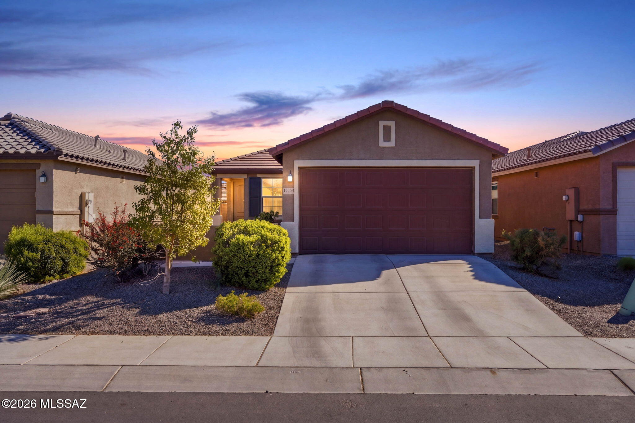Seller will accept and/or counter offers between $329,977 - $339,977. Seller Concessions for Buyer at the Higher Range. Only 4 years New! Great Room concept. 1,465 Square Feet. 3 Bedrooms, 2 Bathrooms, Primary has dual vanities, walk in shower and walk in closet. There is also a walk in closet in the secondary bedroom. Split Floor plan. Laundry Room. Kitchen has a walk in pantry, gas range, microwave & dishwasher all energy efficient appliances, granite counter tops & white cabinets. Window above the Kitchen sink, Island with seating. Ceramic  Tile through out except the Bedrooms. Backyard is finished with decorative gravel and plants on a drip system. Move In Ready. Walk to the park around the corner. Gladden Farms is growing, shopping, restaurants & more! Enjoy this wonderful community.