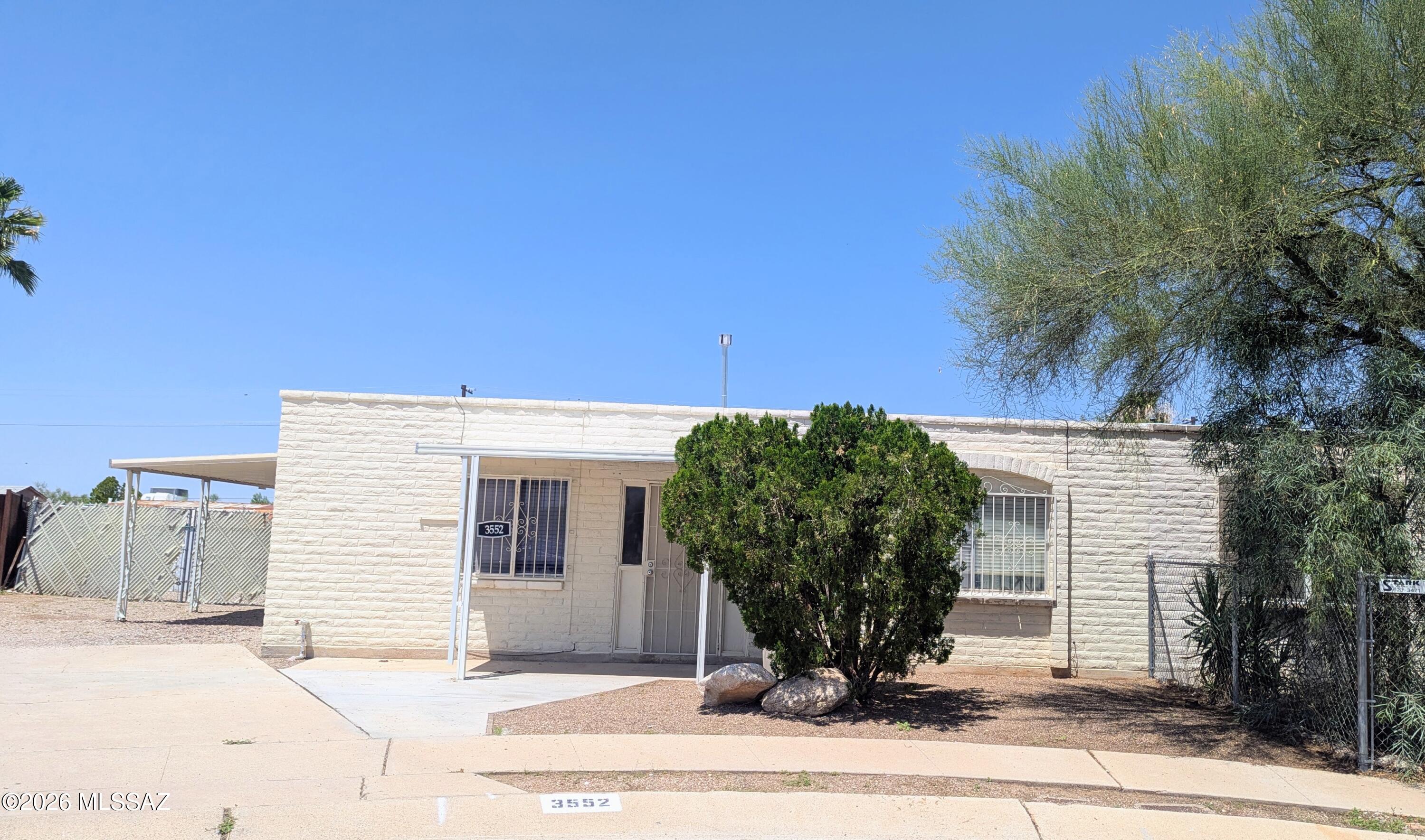 Super cute 2 bedroom townhome situated on a large, fenced lot and move in ready. Located close to DMAFB, schools, and shopping. No carpet, fresh paint, a covered patio, and no there's HOA. Would make a great starter home or investment opportunity. Seller concessions and a home warranty available.