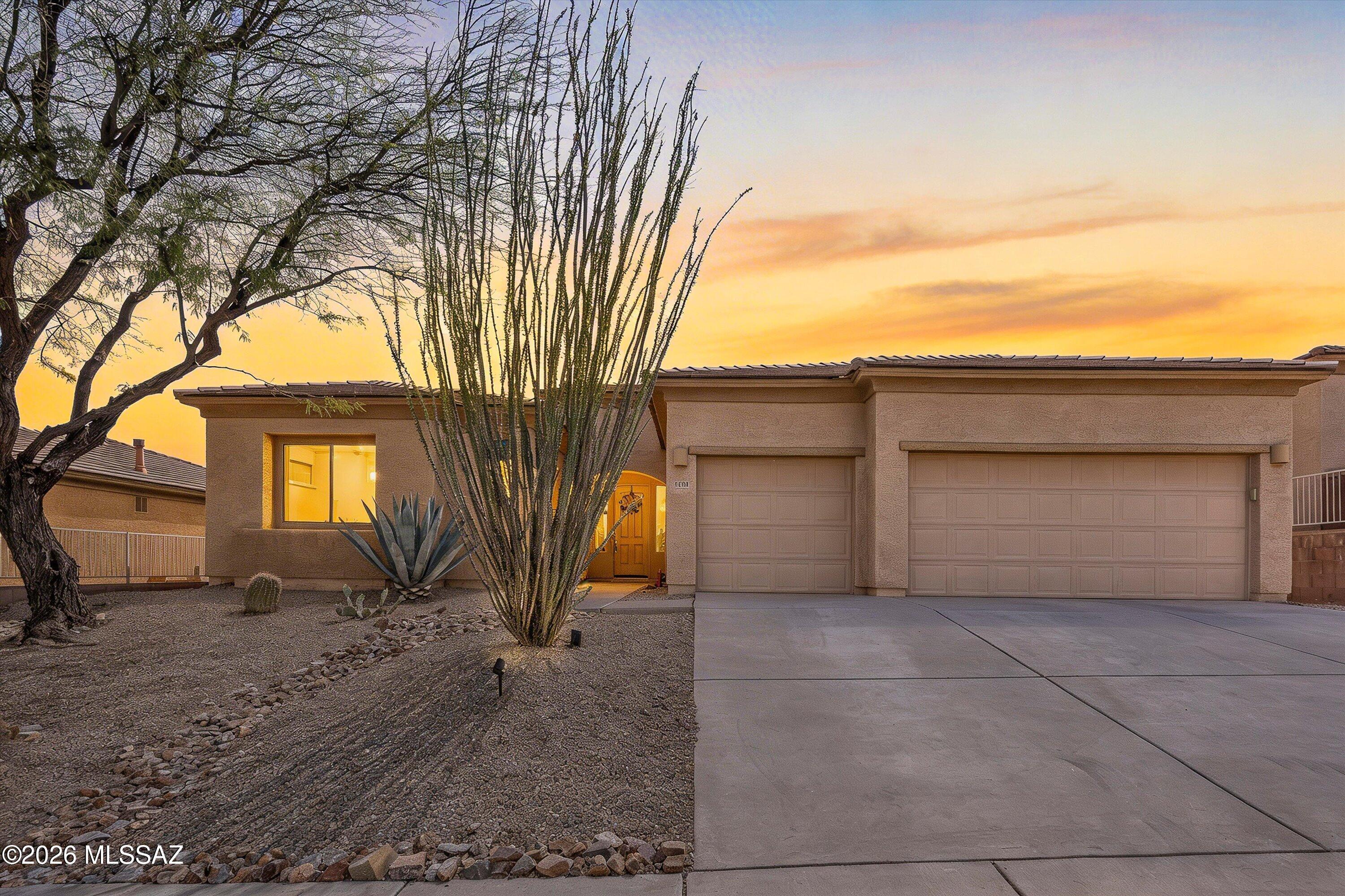 Located in the desirable Las Campanas community of Green Valley, this beautifully maintained single-story home offers the perfect blend of comfort, convenience, and active adult living. Situated in a welcoming 55+ community, the home is just moments from one of the 14 Green Valley Recreation facilities, providing exceptional amenities including swimming pools, fitness centers, racquetball, social activities, and countless opportunities to stay active and connected. The surrounding area offers easy access to scenic golf courses, local dining, shopping, and everyday conveniences that make Green Valley such a sought-after destination. Inside, the home features a bright, open layout with neutral tones and soaring ceilings that create an inviting and airy feel throughout. The thoughtfully designed kitchen offers abundant cabinetry, stainless steel appliances, and a gas stove, making it ideal for both everyday living and entertaining. Spacious living areas flow seamlessly to the private backyard, where a covered patio provides the perfect setting to enjoy peaceful Arizona evenings.
The flexible floor plan includes a den that works beautifully as a home office, hobby room, or additional sitting area, along with a guest bedroom conveniently located near a nearby bathroom. The generously sized primary suite offers a relaxing retreat with a spa-like bathroom designed for comfort and ease. A large laundry room and an attached THREE-car garage add to the home's functionality and appeal.

Impeccably cared for and ideally located near outstanding recreational amenities, this home offers the opportunity to enjoy the vibrant lifestyle that makes Green Valley one of Southern Arizona's most popular active adult communities.