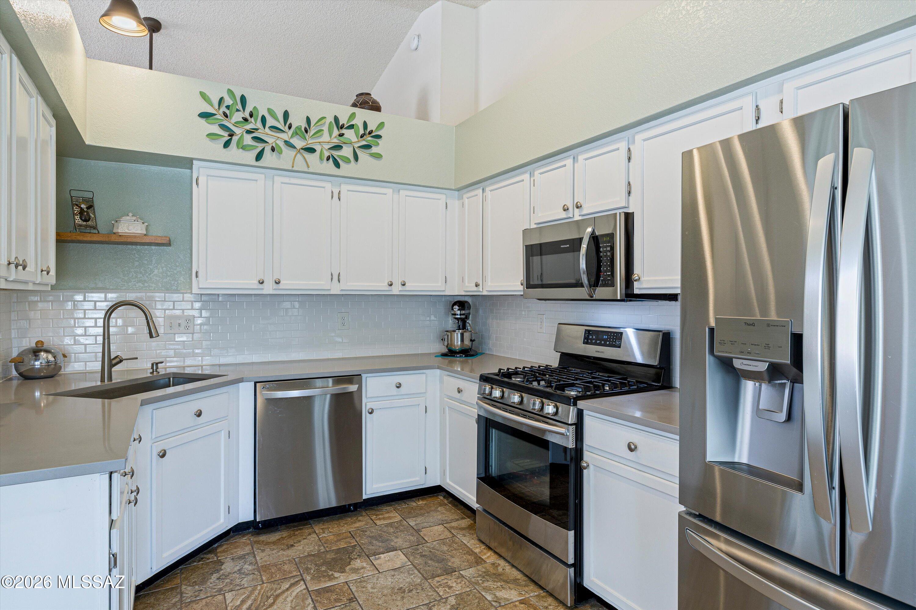 Less to maintain. More to enjoy. Everything you need. This move-in ready, single-level 1,705 sq ft home checks every box for buyers seeking low-maintenance comfort without compromise and delivers something more: a community built for the way you actually want to live.
Step outside your door and into a neighborhood designed around connection and recreation. Two pools, tennis and pickleball courts, sand volleyball, bocce ball, and a playground are all within walking distance, the weekend plans write themselves. Whether you're rallying on the courts Saturday morning, floating the afternoon away poolside, or gathering with neighbors over a bocce match, this community is the rare kind that makes neighbors into friends.
Inside, the home has been thoughtfully updated throughout. Quartz countertops and stainless steel appliances anchor the kitchen. Both bathrooms feature granite countertops and wood-look tile. Quality carpet in the bedrooms installed in 2023, new Pella windows on the front elevation, and NO POLY PIPES. The fully screened Arizona room, accessible from both the primary bedroom and living room, extends your living space year-round, for a quiet cup of coffee in the morning, or a refreshing beverage at happy hour.
A stacked-stone fireplace featuring a custom mantel, updated light fixtures and ceiling fans, and a 2023 water heater and water softener complete a home that has been maintained with genuine care.
You deserve a well-cared for home. See it today.