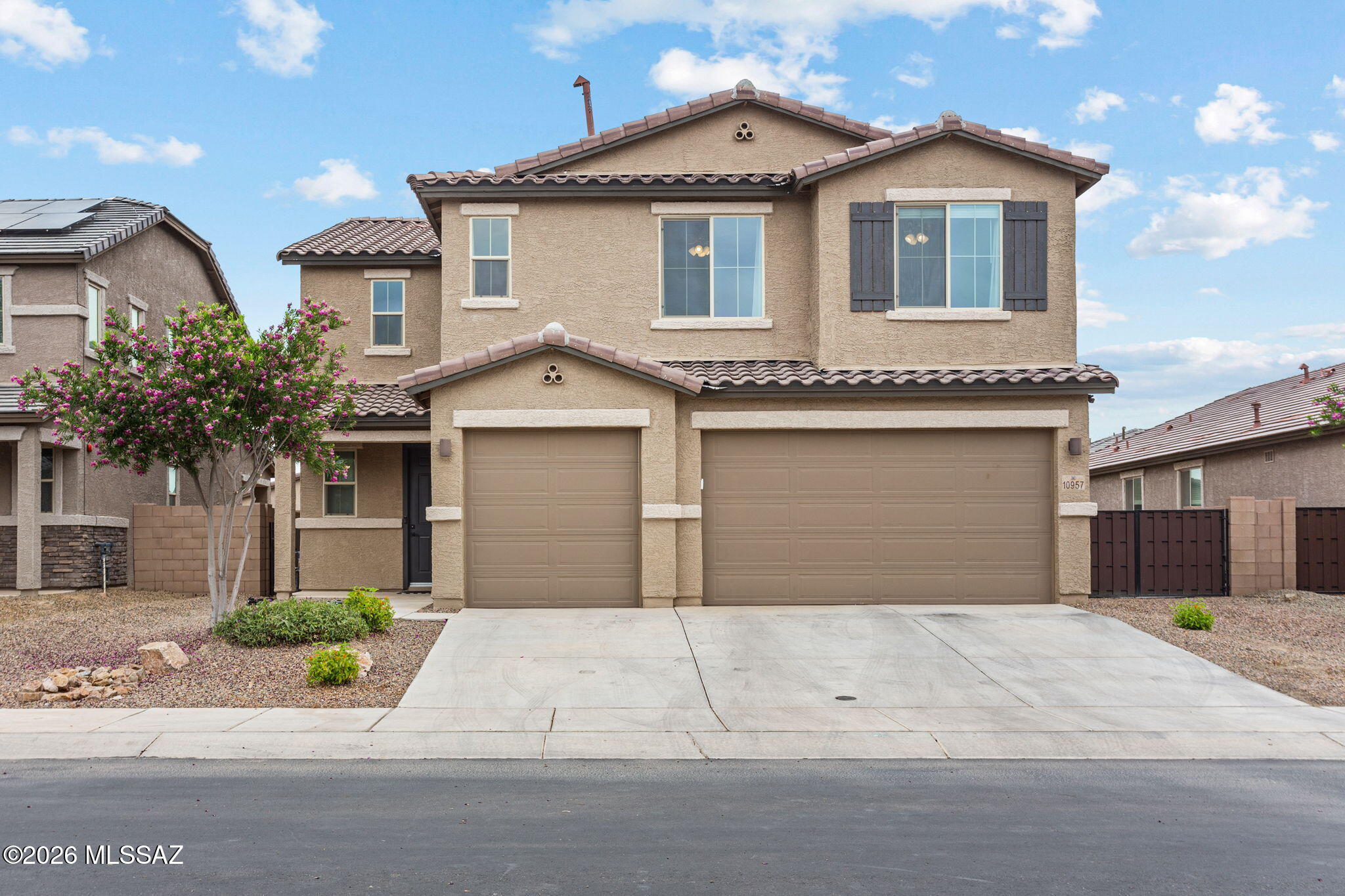 Welcome to your dream home in Marana! This stunning 2-story home is the perfect retreat for family living and summer entertaining. Step outside into your own private oasis featuring a beautifully landscaped yard, sparkling pool, and relaxing spa. This home is everything you need to beat the Arizona heat and make lasting memories all season long.

Inside, the thoughtfully designed kitchen boasts gorgeous quartz countertops and an open layout that's ideal for hosting family and friends. Whether you're prepping for a backyard BBQ or a cozy dinner at home, this space was made for bringing people together.

With plenty of room to grow and a location in the heart of Marana, this home truly has it all. Don't miss your chance to make this incredible property yours, summer is calling!
