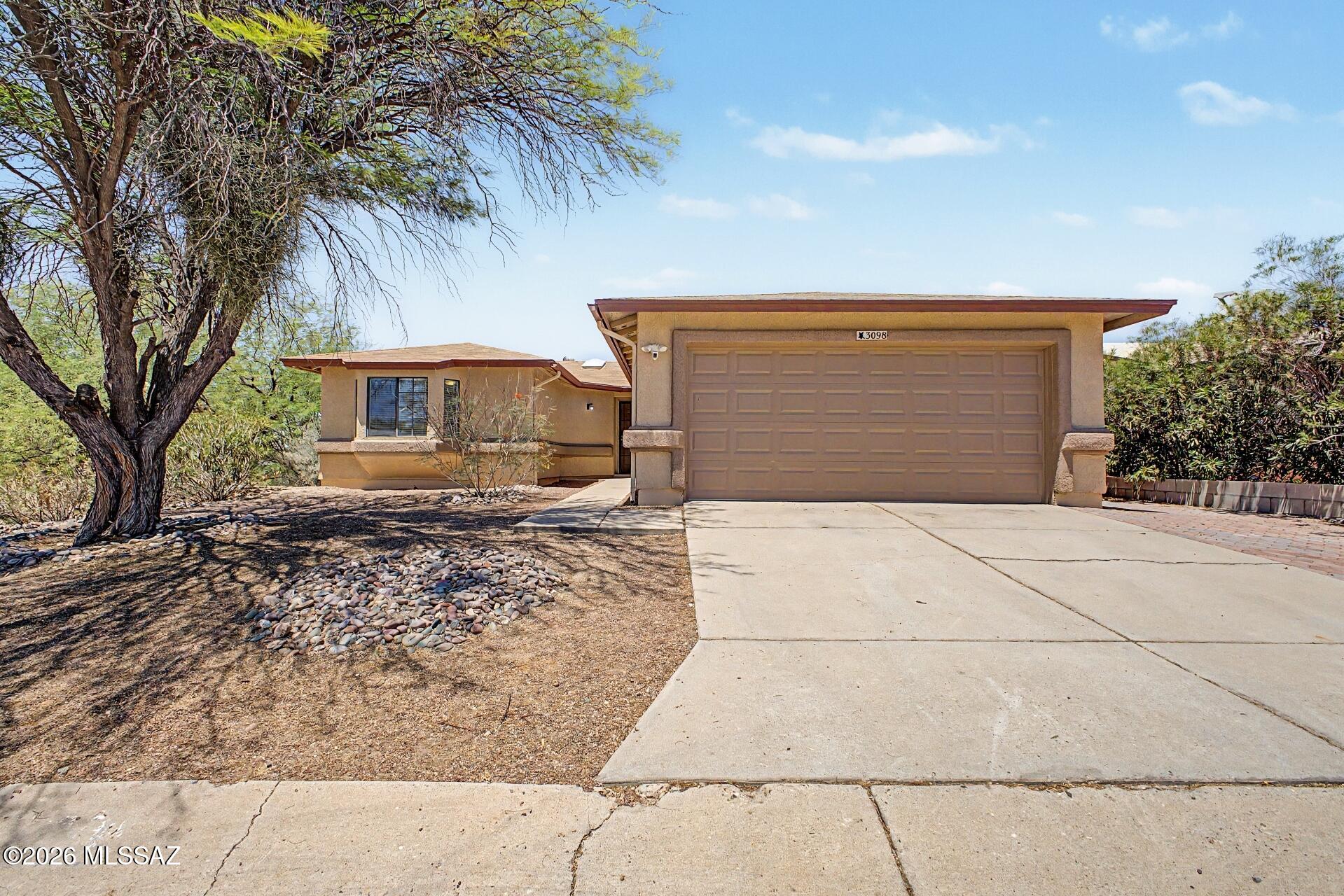 MOST IMPORTANT! SEE THIS BEAUTIFUL HOME AND ASK ABOUT THE GRANT MONEY AVAILABLE FOR THE DOWNPAYMENT AND CLOSING COSTS, NEITHER HAVE TO BE REPAID UPON ACCEPTABLE QUALIFICATION!  
    Perched on an elevated lot in East Tucson, 3098 S Giovanna Drive offers move-in ready comfort with added privacy, open views, and a premium location within a growing community. With no neighbor on the south side, the home enjoys a more spacious, open feel that's hard to find.

Inside, you'll find updated flooring, modern appliances, and a clean, contemporary feel throughout. Step outside to a beautifully finished paver backyard designed for easy outdoor living--perfect for relaxing evenings or entertaining guests.   DON'T MISS OUT VISITING THIS HOME, GREAT FAMILY ENVIRONMENT IN THIS COMMUNITY! IDEAL FOR KIDS Also, this home has dual cooling with a new A/C Unit plus Evaporative Cooling when needed...all of this plus no Poly Pipes and a short walk to refurbished Community Pool coming soon!