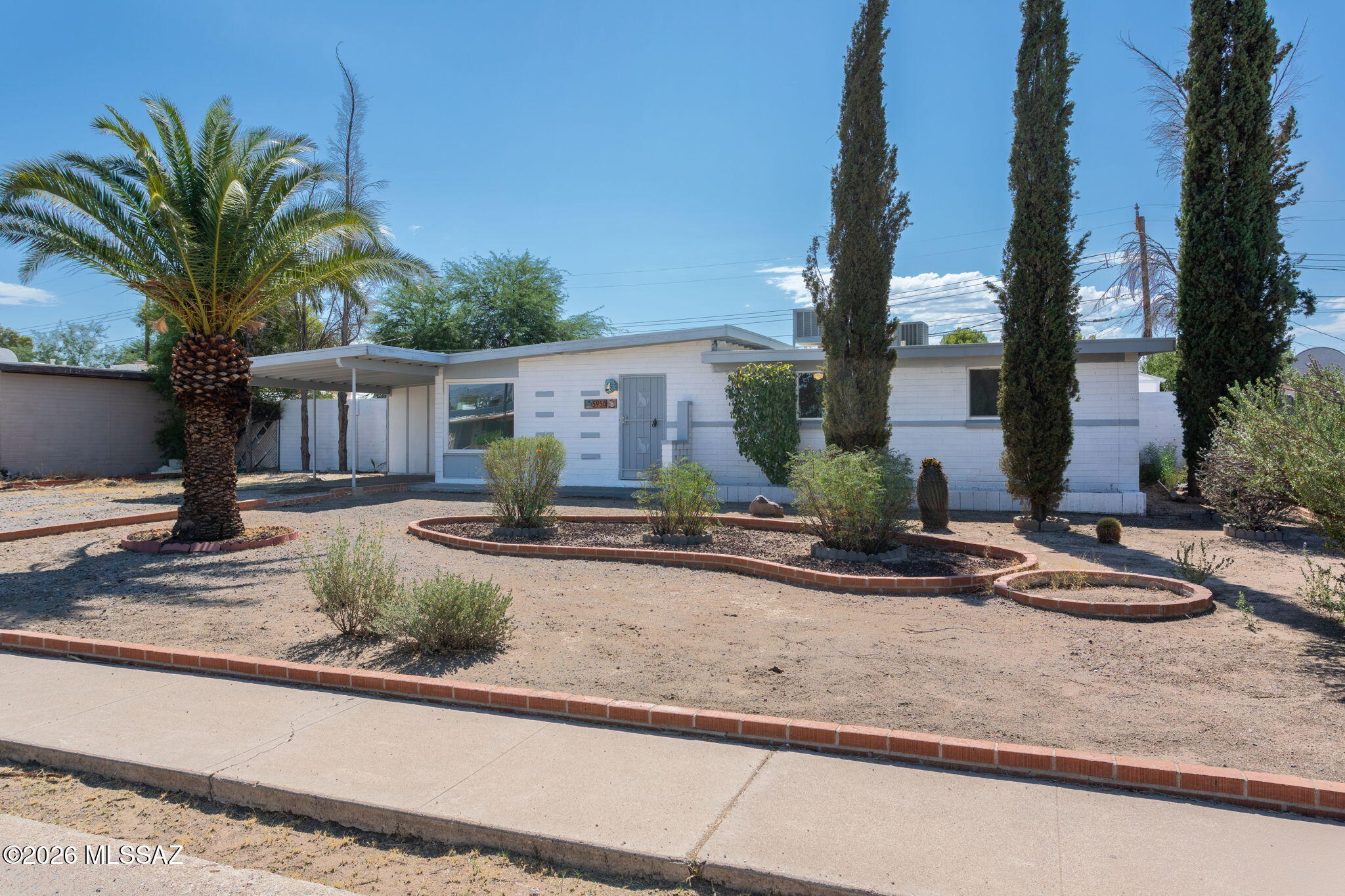 Beautifully updated 3-bedroom, 2-bath home in Tucson's Corbett area that blends timeless character with thoughtful modern updates. Originally built in 1962, this home has maintained its unique charm while offering refreshed finishes throughout. Featuring tile flooring and updated baseboards, the interior offers a clean, cohesive feel. Step outside to a spacious backyard ideal for entertaining, gatherings, or simply enjoying the outdoors. Includes a Tuff Shed with ample room to utilize it as a workshop or storage. A great opportunity to own a home with character, comfort, and room to enjoy.  Owner Financing available with as little as 10% down.