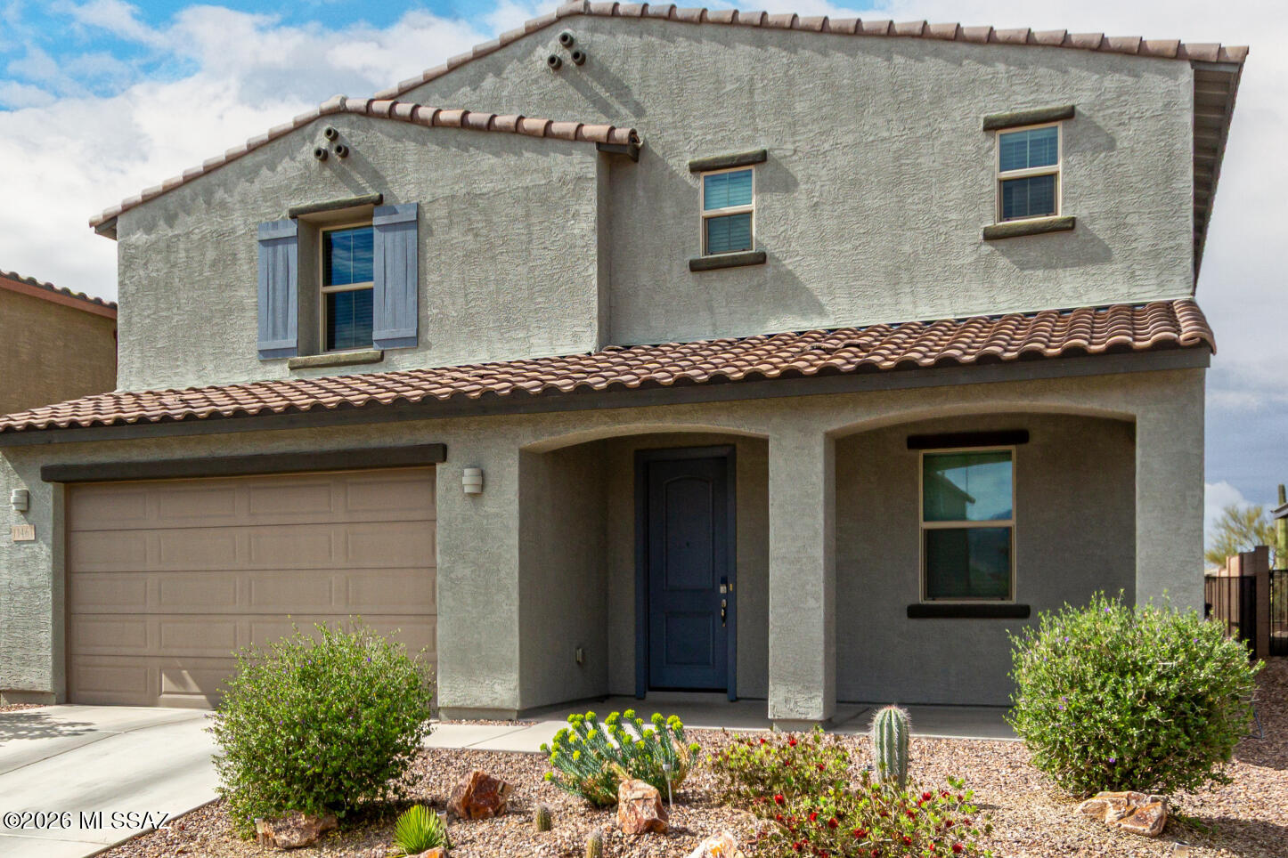 Luxurious 5bedroom, 3bath home backing to green space for privacy & beautiful desert views. Best neighborhood in Oro Valley, Saguaros Viejos, perfectly abuts Wilson K-8 to the north & Ironwood Ridge High to the South . Three luxurious community gates. Immaculately maintained, like new. Granite Counter tops, extended height maple cabinets, expansive island w built in sink. Drop-in gas cook top, wall oven. Stainless Steel appliances incl stove hood. Formal dining room can convert to flex/office space. Luxury upgrades throughout including fire sprinklers in ceiling. Upgraded horizontal blinds. Executive height vanities. Luxury lighting & bath finishings, large walk-in closets. Smart panel for Ethernet & home wiring. $15,000 incentive to pay for the already installed solar panels. Stunning 5 Bedroom + Loft Home with Solar, Pool & Upgrades Throughout!

Welcome to this beautifully upgraded 5 bedroom, 3 bathroom home offering generous living space, modern finishes, and incredible outdoor amenities. Featuring leased solar panels ($191/month) for energy efficiency and lower utility costs, this home combines comfort and savings.

Step inside to an open-concept floor plan with wood plank tile flooring and abundant natural light. The spacious kitchen boasts upgraded cabinetry, granite countertops, stainless steel appliances, a large island with breakfast bar, and a walk-in pantry--perfect for entertaining and everyday living. The open dining and great room layout flows seamlessly for gatherings of any size.

Downstairs includes a bedroom and full bath, ideal for guest or multigenerational living. Upstairs you'll find a versatile loft space, generously sized secondary bedrooms, and a luxurious primary suite featuring a walk-in closet and spa-inspired bath with dual sinks and separate tub/shower.

Enjoy Arizona living at its finest in the backyard oasis complete with a private pool, extended patio, and no neighbors directly behind for added privacy. Additional highlights include a 3-car garage, gas water heater, water softener, large closets throughout, and a convenient upstairs laundry room.

Located in a desirable community near parks, shopping, dining, and freeway access--this home truly has it all! Close to Starbucks, shopping, schools, churches, restaurants.