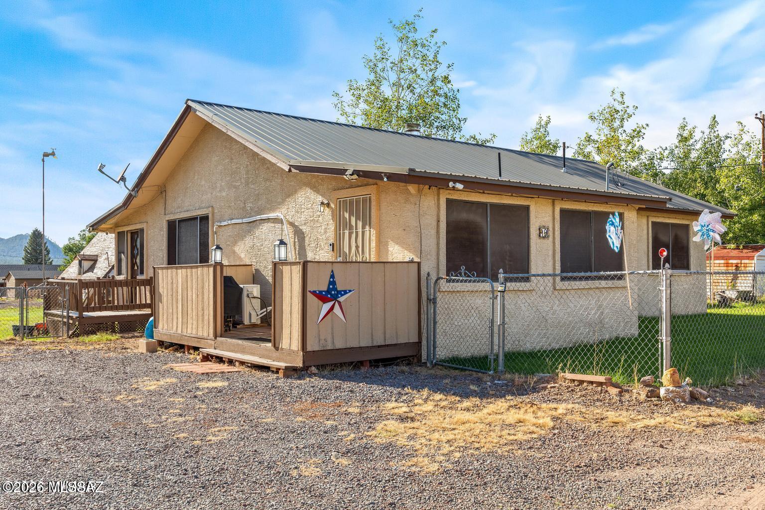 **TURNKEY, NO HOA & RIGHT IN THE HEART OF ALPINE--this charming 2-bedroom, 1-bath mountain home is just minutes from restaurants, shopping, and all the amenities!**
Tucked right in the heart of Alpine, this charming 2-bedroom, 1-bath mountain home is ready to welcome you to the easygoing White Mountains lifestyle. With approximately 1,370 square feet on a quarter-acre lot, you'll enjoy the convenience of being close to local restaurants, stores, and everyday amenities while still feeling perfectly at home in the pines. Inside, the home feels bright, spacious, and inviting, with a large kitchen and great room made for gathering, relaxing, and enjoying slow mountain mornings A convenient mudroom gives you the perfect place to drop boots and outdoor gear, while an additional room offers even more storage or flexible space. The recently remodeled bathroom features a beautiful walk-in shower and a fresh, updated feel.
Step outside to the fully fenced backyard, where mature aspen trees add that special touch of Alpine charm. There's plenty of room for pets, outdoor seating, or quiet evenings under the stars, plus a Tuff Shed for added storage.
Turnkey and ready to go, this home is a wonderful option for full-time living, a seasonal escape, or a weekend getaway. Alpine is known for world-class hunting and fishing, along with nearby lakes, streams, rivers, ponds, hiking, and biking trails--an outdoor lover's playground in every season.
Bring your clothes, your toothbrush, and your sense of adventure--your little piece of Alpine is waiting.