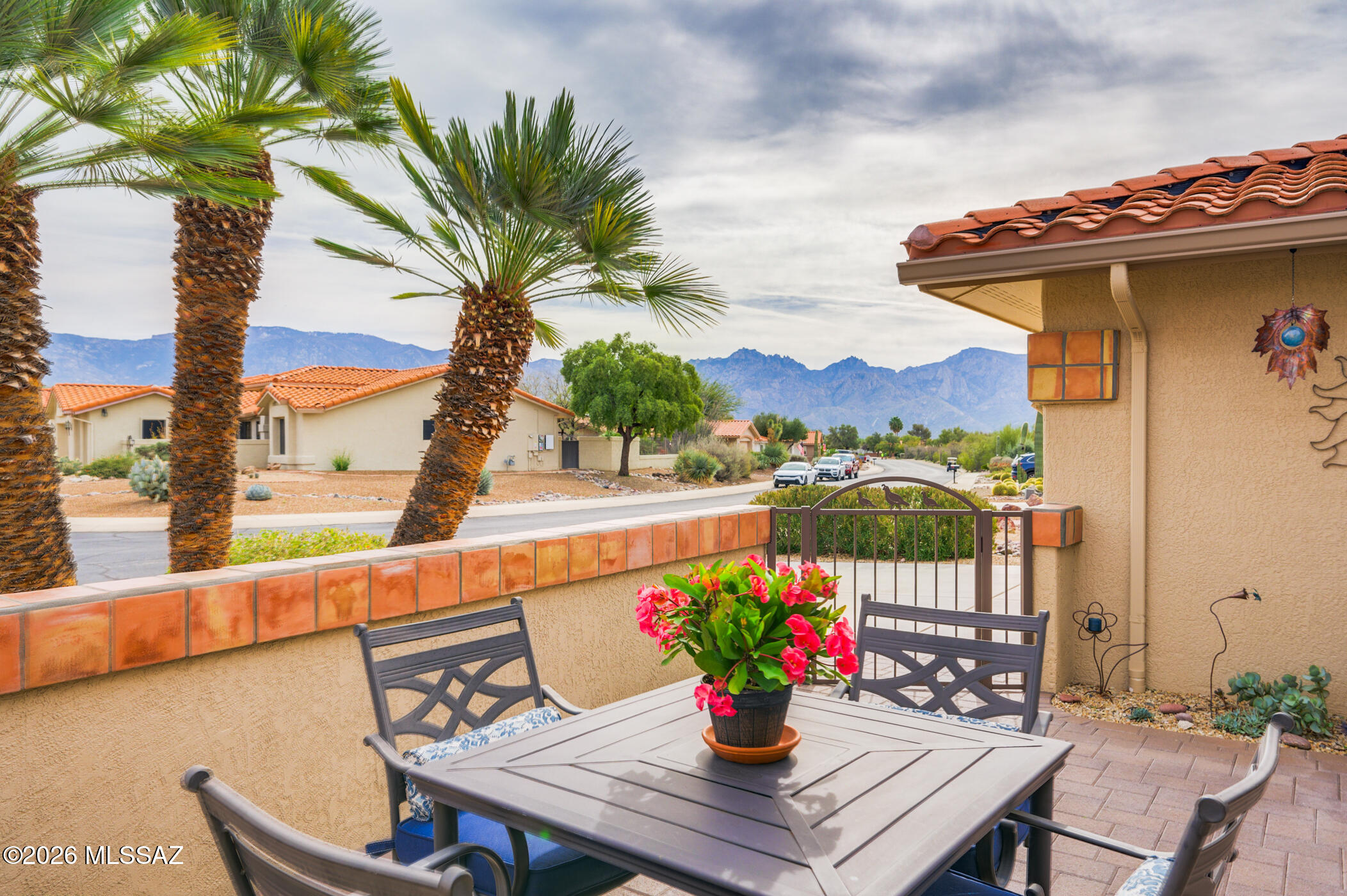If you've been waiting for gorgeous views and a move-in ready, thoughtfully updated home in coveted Sun City Oro Valley, this could be your lucky day! Boasting high quality custom finishes, this remodeled Tortolita model home is a showstopper. You'll enjoy mountain & desert views from almost every room, plus stunning sunsets from the expansive paver patio & beautifully maintained fenced backyard. This gorgeous home features LVP flooring, carpeted bedrooms, sparkling newer windows, updated lighting, open great-room design, welcoming front patio with Catalina Mountain Views, 2 cozy fireplaces, Plantation Shutters & so much more! New roof (2019) and HVAC (2020) will provide years of trouble-free service. The stylish, remodeled Chef's kitchen features modern stainless-steel appliances, updated shaker-style cabinets, granite countertops, tile backsplash & a large island w/breakfast bar. The spacious Primary bedroom is a comfortable retreat featuring mountain views from the bay window with built-in window seat, plus an updated en-suite bath boasting a granite-topped vanity, walk-in closet & shower. The roomy guest bedroom has plenty of closet space, a Murphy bed & is located next to the updated hall bath. The den is a bonus you'll love as it offers a built-in desk, shelving & a built-in electric fireplace. Enjoy outdoor living in the peaceful, easy-care backyard as you soak in the gorgeous, panoramic views of the Sonoran Desert & the Tortolita Mountain range. It's hard to find a home that has it all - the views & updates most people crave! Don't miss your opportunity to own a small slice of heaven on earth in Sun City Oro Valley! We invite you to call us today to schedule your private showing. Begin your active adult lifestyle today!
