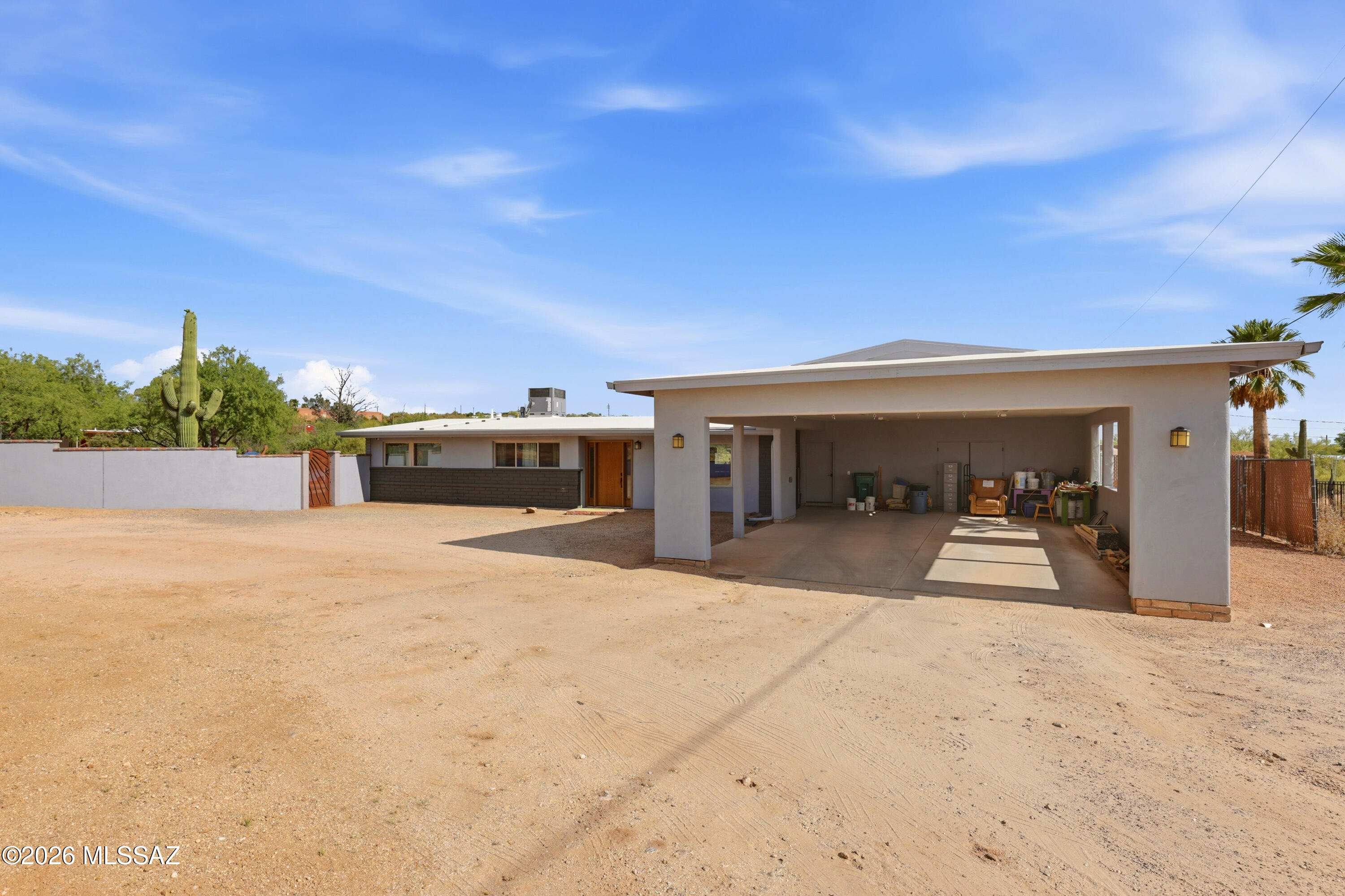 Welcome to 220 E. Magee in desirable Suffolk Hills. This single-level ranch offers 3 bedrooms, 3 bathrooms, and 1,930 square feet on a spacious 1.22 acre lot.
Inside, the home features a comfortable ranch layout designed for easy living and entertaining. Owned solar adds valuable energy efficiency and long-term savings.
The outdoor living space is a true highlight, featuring a sparkling pool, a beautiful flagstone fireplace, and sweeping Catalina Mountain views. The expansive lot provides privacy, open space, and endless potential for outdoor enjoyment.
A 4-car carport and circular driveway offer abundant parking, making it easy to host gatherings or accommodate multiple vehicles.
Ideally located in one of Tucson's most convenient Northwest areas. This home is close to grocery stores, popular restaurants, and Immaculate Heart School. Outdoor lovers will appreciate nearby walking trails.
Blending location, lifestyle, and views, this home delivers the best of Tucson living--proximity to everyday conveniences, resort-style outdoor amenities and the natural beauty of the Catalina Mountains, all in one exceptional home.