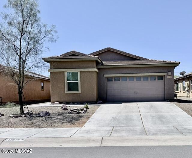 Beautifully upgraded home featuring rich Crown Royal cabinetry, granite countertops, and stainless steel appliances. The desirable split floor plan offers 3 bedrooms plus a den, providing flexibility for a home office, hobby room, or additional living space. Elegant 18-inch tile flooring runs throughout the main living areas, with carpet in two of the guest bedrooms for added comfort. The spacious primary suite includes a large walk-in closet with custom shelving, a separate shower, and a relaxing jetted Jacuzzi tub. Enjoy the extra-large backyard with endless possibilities for outdoor entertaining, play areas, gardening, or even a future pool.  HVAC replaced May 2024