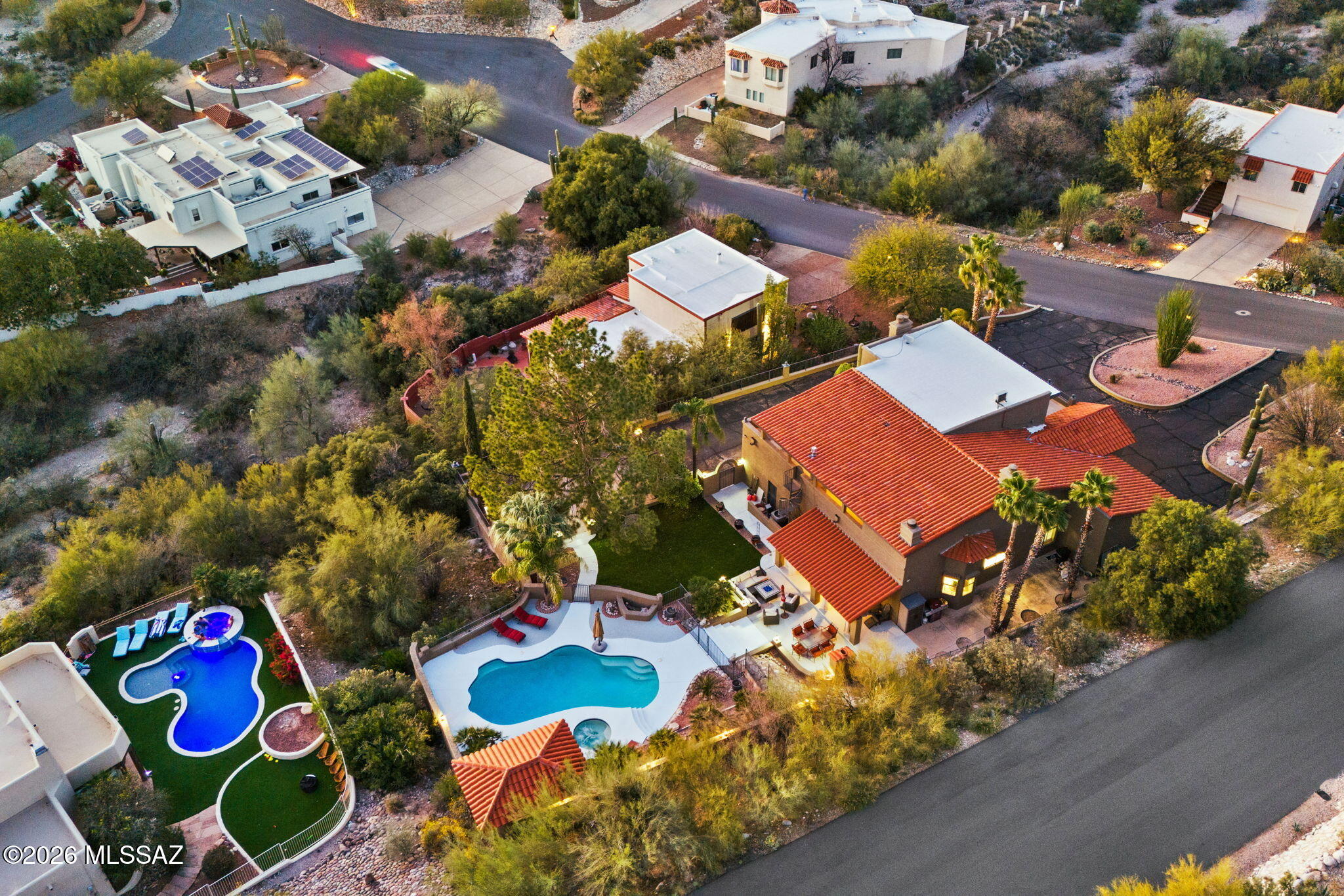Perched in the Catalina Foothills, 5814 E Río Verde Vista Drive is the kind of home that stops you in your tracks. With over 4,000 square feet, this stunning property was designed to soak in the sweeping mountain and city views from nearly every angle.

Inside, the home offers two primary suites, giving flexibility for guests, multigenerational living, or the ultimate private retreat. The newly renovated kitchen is both beautiful and functional, opening to generous living spaces anchored by multiple fireplaces that add warmth and character throughout.

Step outside and it only gets better. A gorgeous pool, wrap-around deck, and lush turf areas create the perfect setting for entertaining or simply enjoying those  incredible Arizona sunsets. The outdoor kitchen makes hosting effortless while the expansive lot provides privacy and room to breathe.

All of this just minutes from top-rated BASIS schools, shopping, and dining, while still feeling tucked away in the beauty of the Foothills.

Homes with this much space, views, and thoughtful upgrades don't come around often. This one truly delivers the luxury Arizona lifestyle.