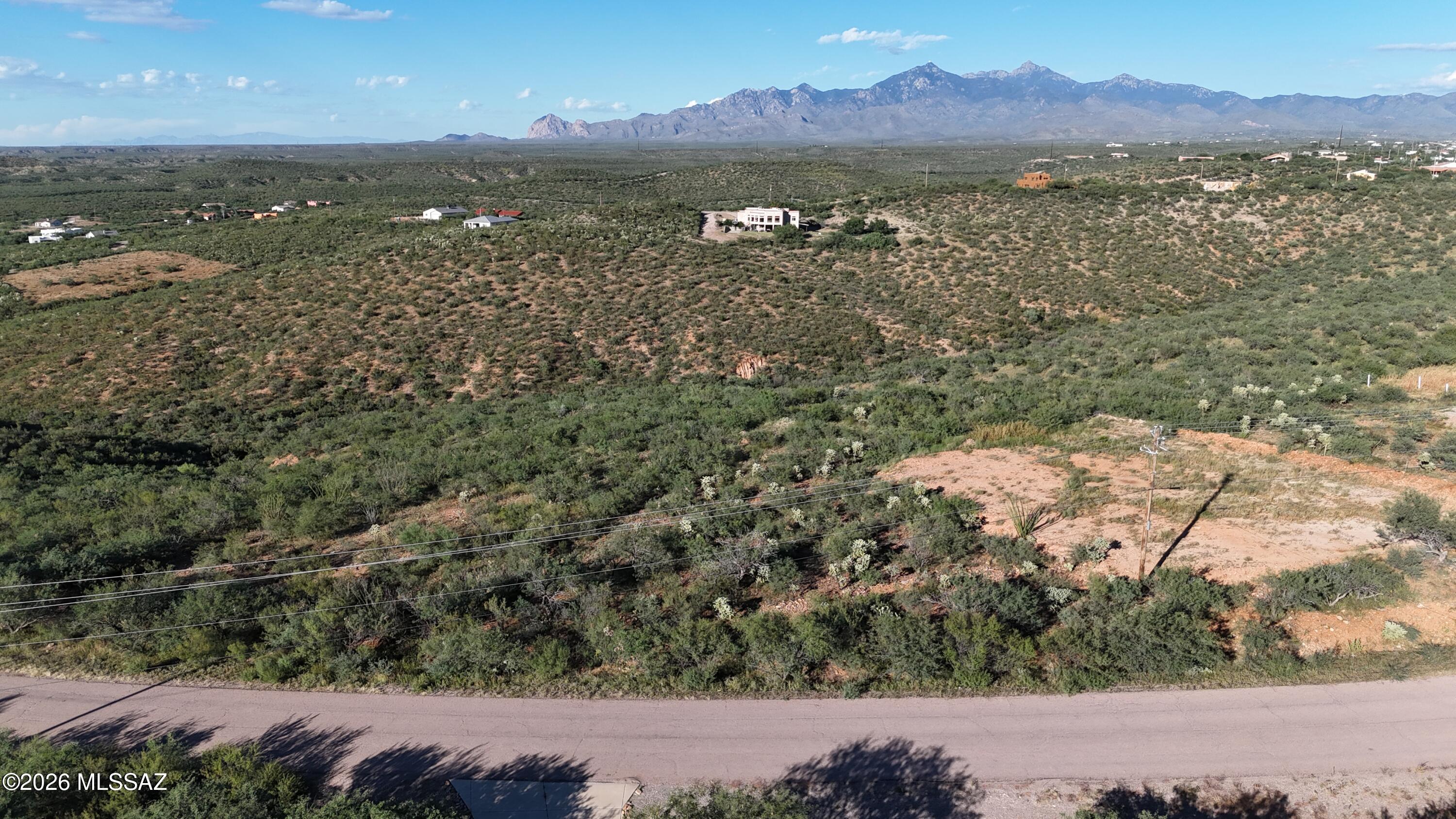 These two lots are part of a 6 lot package.  Sold as one bulk sale for $90,000.
The other lots are
313 Circulo Cataluna
321 Circulo Cataluna
36 Calle Marruecos
37 Avenida de las Naciones
All the lots have electric and water at the street.  The photos are of 37 Avenida de las Naciones.
