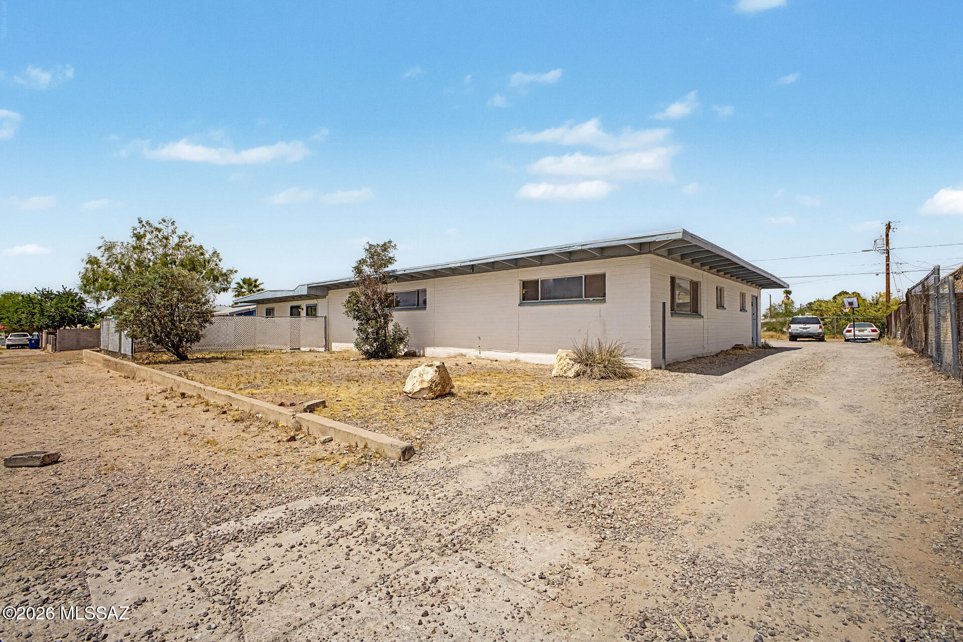 Don't miss this exceptional investment opportunity to own a well-maintained quadruplex in a highly desirable location! This versatile income-producing property features a thoughtfully designed unit mix, including two spacious 2-bedroom, 1-bathroom units, one 2-bedroom, 2-bathroom unit, and one generously sized 3-bedroom, 1-bathroom unit--offering broad appeal for a variety of tenants.

Each unit is designed for comfortable everyday living with bright, open living spaces, durable tile flooring throughout with carpeting in select areas for added warmth and comfort, and functional kitchens featuring ample counter space and built-in appliances. Private patios provide residents with their own outdoor retreat, while dedicated parking adds everyday convenience.

Ideally situated near popular restaurants, shopping centers, parks, schools, and other local amenities, this property offers the perfect combination of location, livability, and investment potential. Whether you're looking to expand your real estate portfolio or secure a property with strong rental appeal, this quadruplex is an outstanding opportunity you won't want to miss!