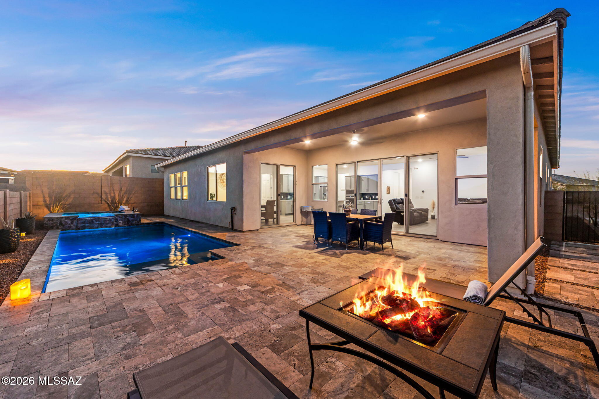 Range Priced-Seller will accept/or counter offers b/w $650,000 & $700,000. Welcome to your desert retreat, featuring beautiful mountain & sunset views and a luxurious heated pool and spa that truly set this home apart. This beauty includes 4 spacious bedrooms, 4 bathrooms, a versatile den/office, and a 3-car garage. The open-concept great room is filled with natural light and thoughtfully designed for comfort & functionality. The gourmet kitchen is equipped with upgraded granite countertops, a gas cooktop, large island, a built-in oven & microwave, and modern subway tile backsplash. Step outside to the covered patio and custom paver courtyard, which create inviting outdoor spaces perfect for relaxation or entertaining. This home truly checks all the boxes. Visit today & Fall-In-Love! Nestled within the gated community of Cantabria at Rincon Knolls, along the Rincon Mountain ridgeline, residents can enjoy stunning desert landscapes that showcase the area's natural beauty. The community offers numerous nearby trails, parks, and sports courts for active living. With convenient access to shopping, dining, major employers, and I-10, this neighborhood is ideal for anyone seeking both comfort and convenience. This is more than just a home; it represents refined desert living at its finest.