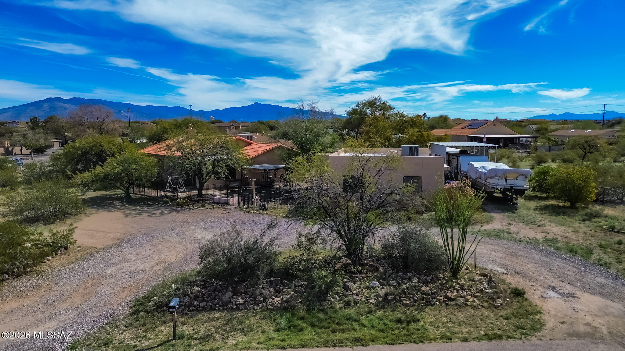 Rare opportunity! Now available 3 bed, 2 bath home plus a detached 2 bed, 1 bath guest house--ideal for multigenerational living or rental income. Main home features a gas fireplace, private patio, and screened-in tiled Arizona room. Enjoy a shared courtyard w/ pergola, paved walkways, and mature citrus trees. Separate fenced yards & entrances offer added privacy. Property includes a finished 2-car garage w/ heating & cooling, 2-car steel carport, RV/boat carport, & additional steel custom RV parking. Unaffixed RV included for storage/workshop. New HVAC (March 2026) w/ 10 year warranty. Convenient I-10 access.
Seller to offer 1% of purchase price to buyer's concessions w/ accepted offer.
Offers reviewed $549K-$609K. Full list of upgrades available.