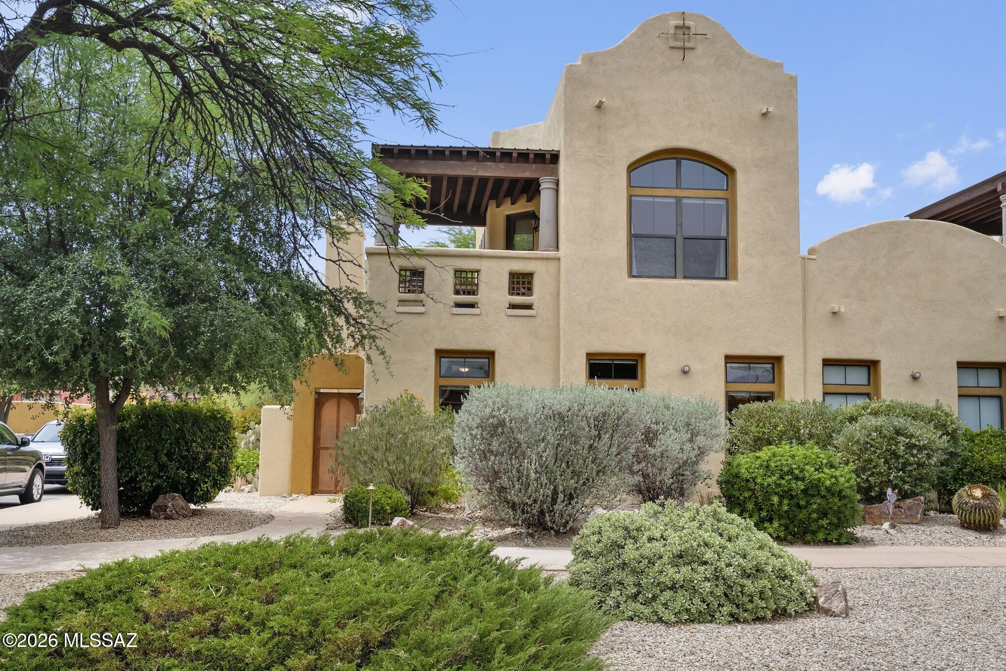 Enjoy every beautiful day from this spacious Embarcadero townhome, perfectly positioned in the best location in the community, a prime corner lot with east-facing views of the Santa Rita Mountains.

Designed for comfort, flexibility, and privacy, the home features two primary suites with walk-in closets, one conveniently located on the main level, and another privately situated upstairs. A third bedroom adds even more versatility for guests, an office, or hobbies. With its generous proportions, this is a large townhome ideal for full-time living, a second home, or a vacation rental. New roof and water heater as of April 2026. Outdoor living shines with multiple private spaces, including a charming walled courtyard on the lower level, and an elevated skydeck featuring a built-in grill, an outdoor sink, and added privacy from the mature tree canopy.

The open kitchen showcases custom cabinetry, granite countertops, new stainless steel kitchen appliances, while the utility room includes a stackable washer and dryer for everyday convenience. Warm Southwestern touches, including a kiva-style fireplace, tile flooring, and exposed ceiling beams, add charm and character throughout.

Resort-style amenities include a heated pool, spa, and fitness studio. The Embarcadero is close to the area's best shopping, dining, and recreation, offering convenience right at your doorstep.

A community walking trail connects directly to the 4.5-mile historical Juan Bautista de Anza Trail, with access to the Santa Cruz River, connecting the Village of Tubac to the north, and the Tumacacori Mission to the south, creating an exceptional opportunity for nature lovers, hikers, birders, and history enthusiasts.

A rare blend of views, space, and premier positioning, this Embarcadero townhome is the perfect place to savor the Tubac lifestyle.
