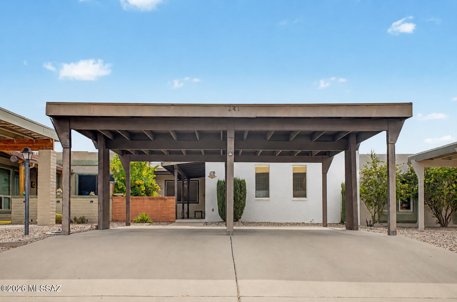 Seize the chance to own this fully furnished 2-bedroom, 2-bath unit in the adult Community of Green Valley Townhomes! You're greeted by a detached carport and a front patio that sets an inviting atmosphere. Discover a serene living room with a soothing palette and plush carpeting for added comfort. The well-appointed kitchen includes ample wood cabinetry and essential built-in appliances for a seamless cooking experience. You'll appreciate the split bedroom plan, offering double built-in closets with mirrored doors that enhance the sense of space and a private bathroom for convenience. Unwind in the enclosed Arizona room or on the back patio, perfect for enjoying a good book or a refreshing drink. The Community boasts shuffleboard courts, a recreation center, and a refreshing pool and spa. Don't miss out on this one!
