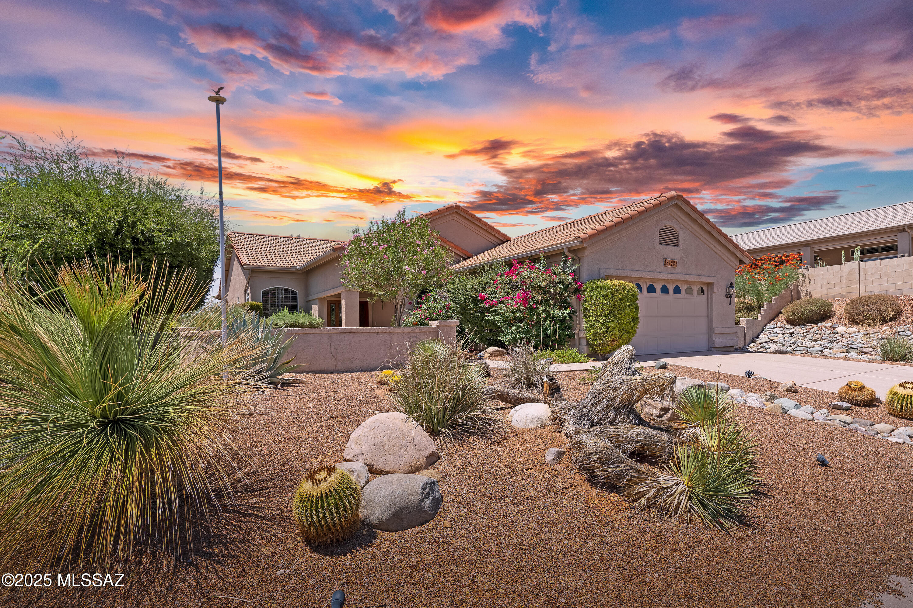 Stunning views in a tight knit community against the Catalinas? Welcome to the highly desirable SaddleBrooke! This beautiful two bedroom two bathroom home is in the heart of it all! Large, open formal and living rooms allow for lots of room for grandkids or friends to gather. Beautiful desert-scape front and back yards to enjoy the incredible AZ winters! Spacious master bedroom with backyard access! Cozy kitchen with eat in dining and formal dining. Plantation shutters add a bonus element of sophistication to the space. Carpet where it counts and tile everywhere else. With resort-style amenities including clubhouse, creative arts& tech center, pools, dining, fitness, sports and social gathering facilities you are practically on vacation every day! We cannot WAIT to welcome you to the club
